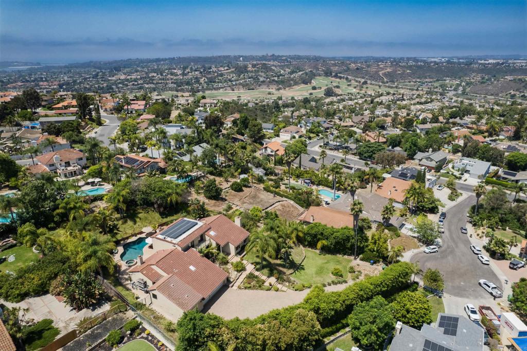 6541 Vispera Place Carlsbad, CA 92009 - Photo 51 of 54 an aerial view of a city with lots of residential buildings