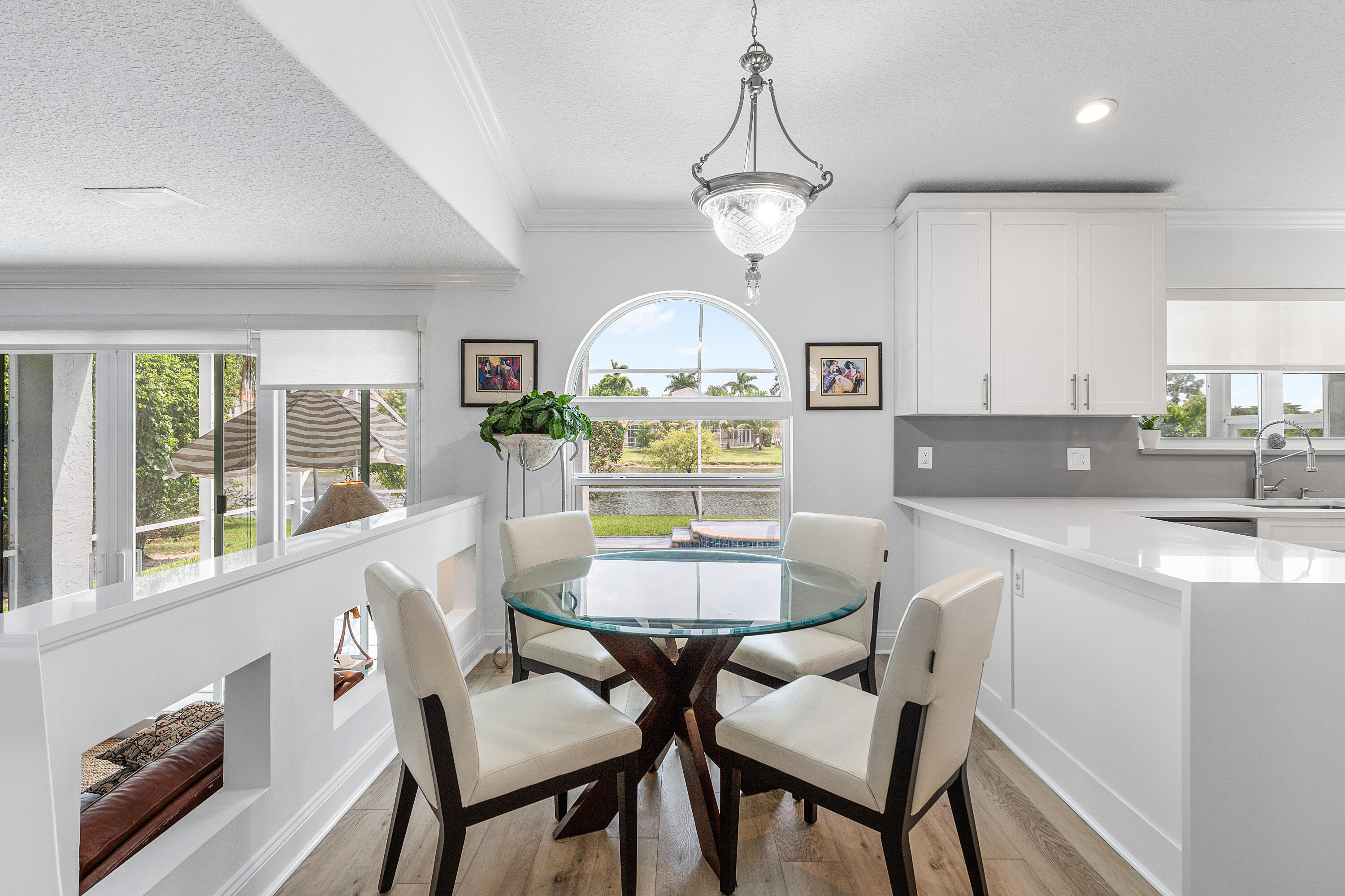 10824 Tea Olive Lane Boca Raton, FL 33498 - Photo 19 of 76 a view of a dining room with furniture window and outside view