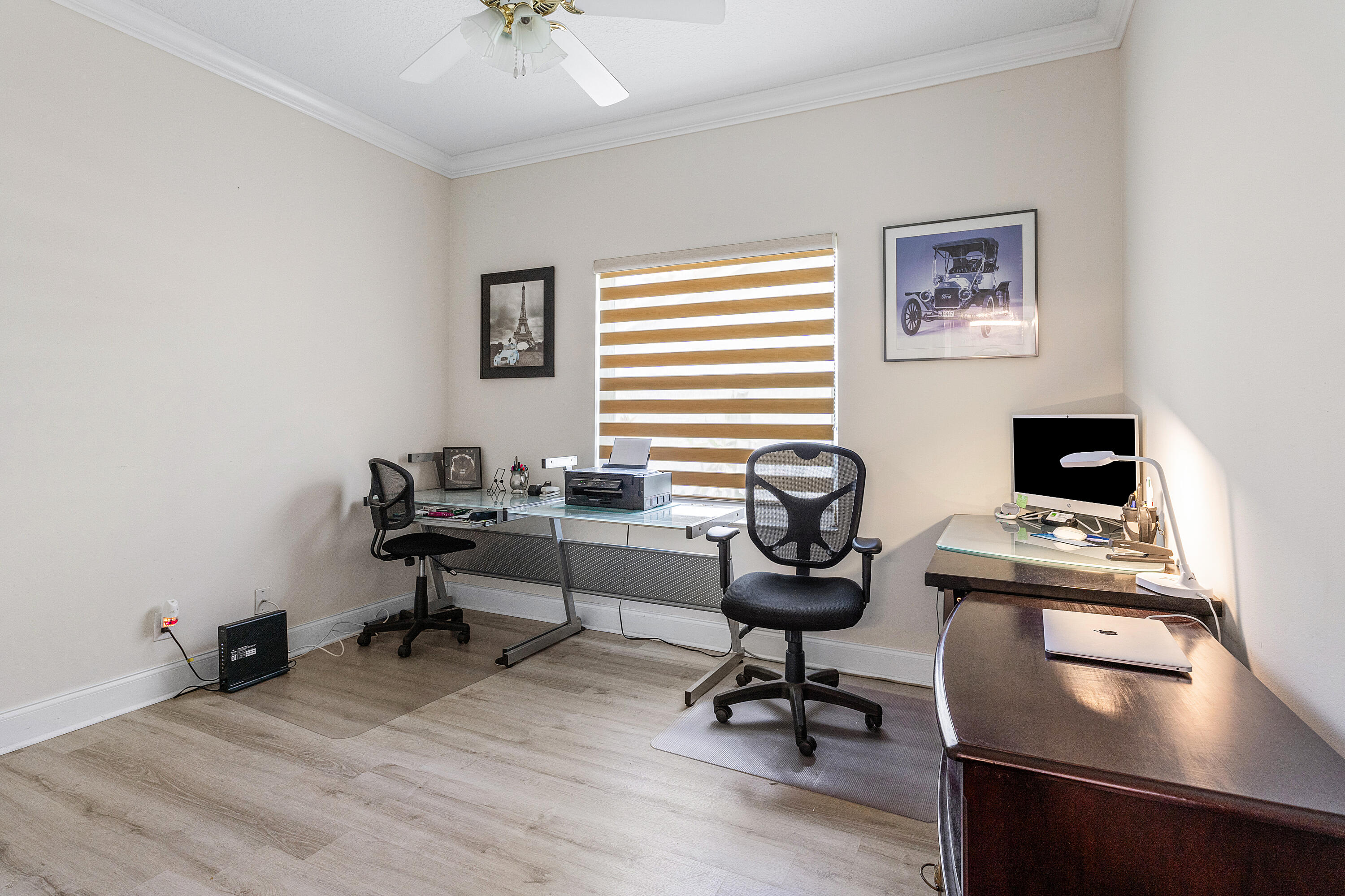 10824 Tea Olive Lane Boca Raton, FL 33498 - Photo 24 of 76 a view of a workspace with furniture and a window