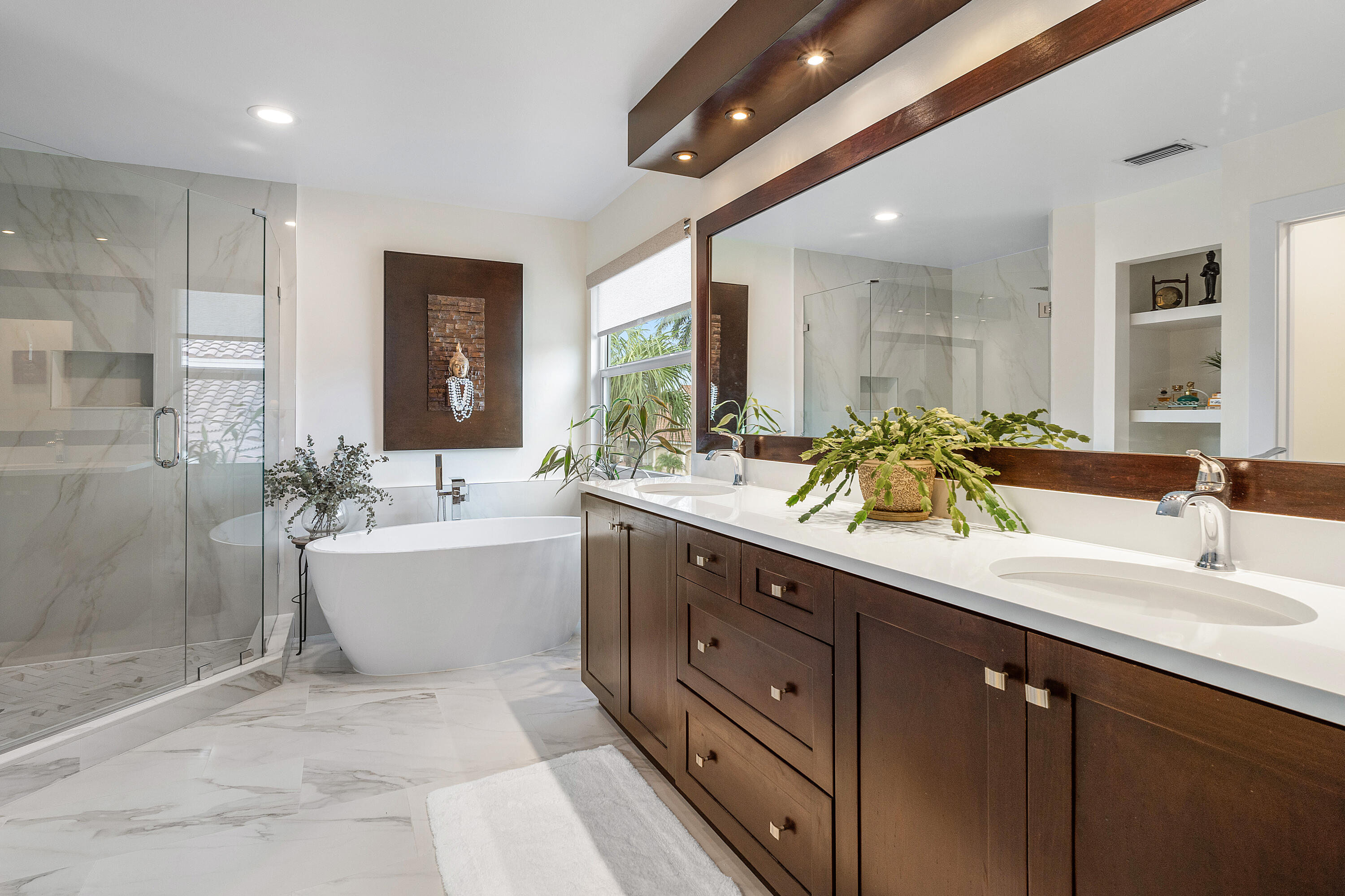 10824 Tea Olive Lane Boca Raton, FL 33498 - Photo 29 of 76 a bathroom with a double vanity sink mirror and bathtub