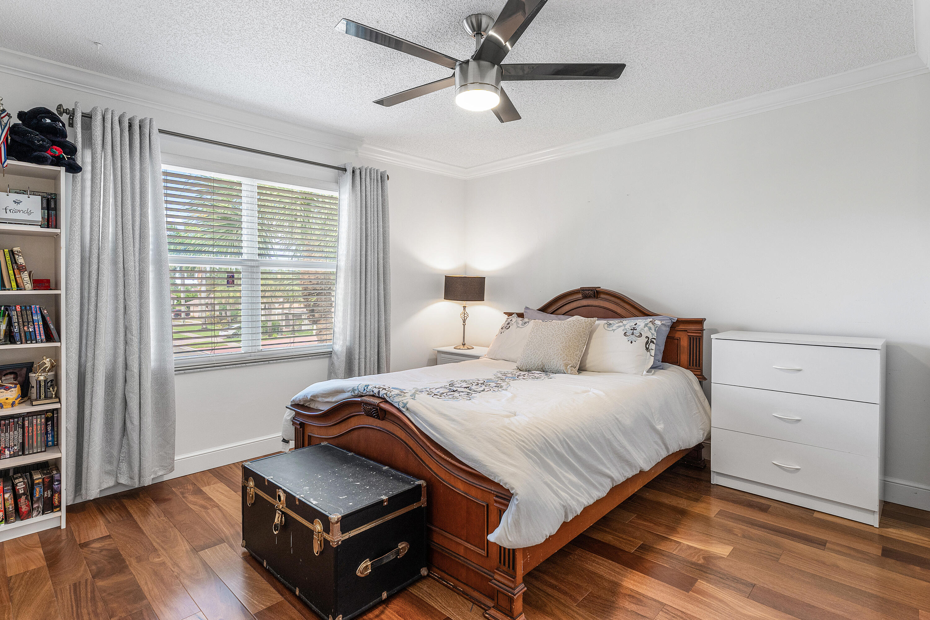 10824 Tea Olive Lane Boca Raton, FL 33498 - Photo 35 of 76 a bedroom with a bed and window