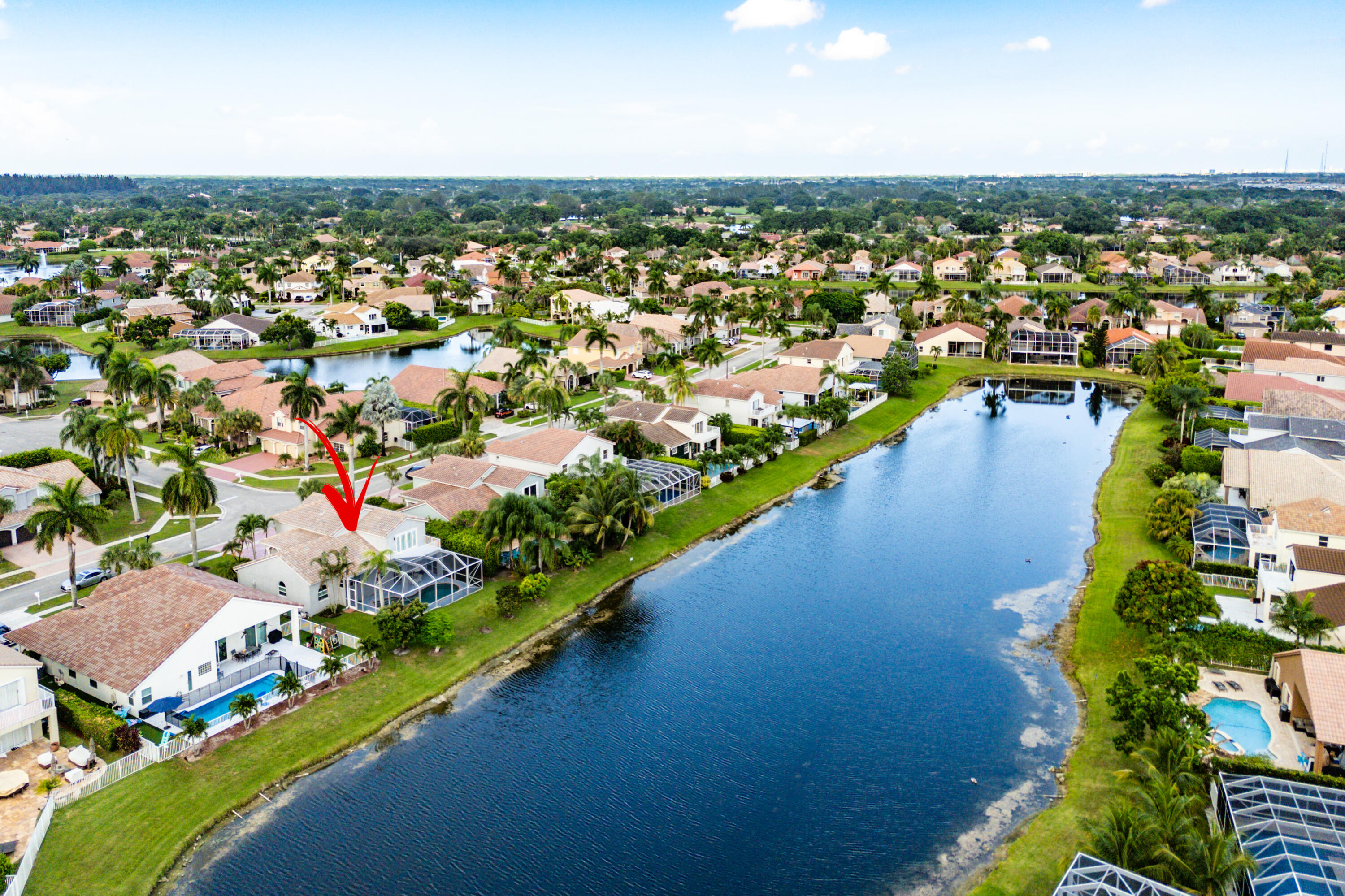 10824 Tea Olive Lane Boca Raton, FL 33498 - Photo 50 of 76 an aerial view of a city with ocean view