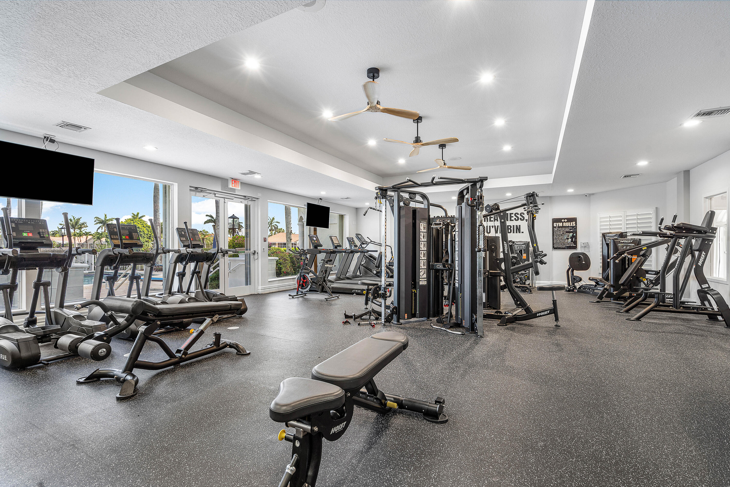 10824 Tea Olive Lane Boca Raton, FL 33498 - Photo 64 of 76 a view of a room with gym equipment