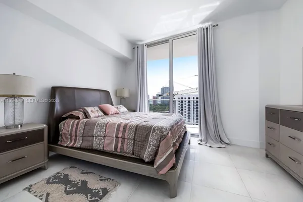 a view of a swimming pool with a lounge chairs