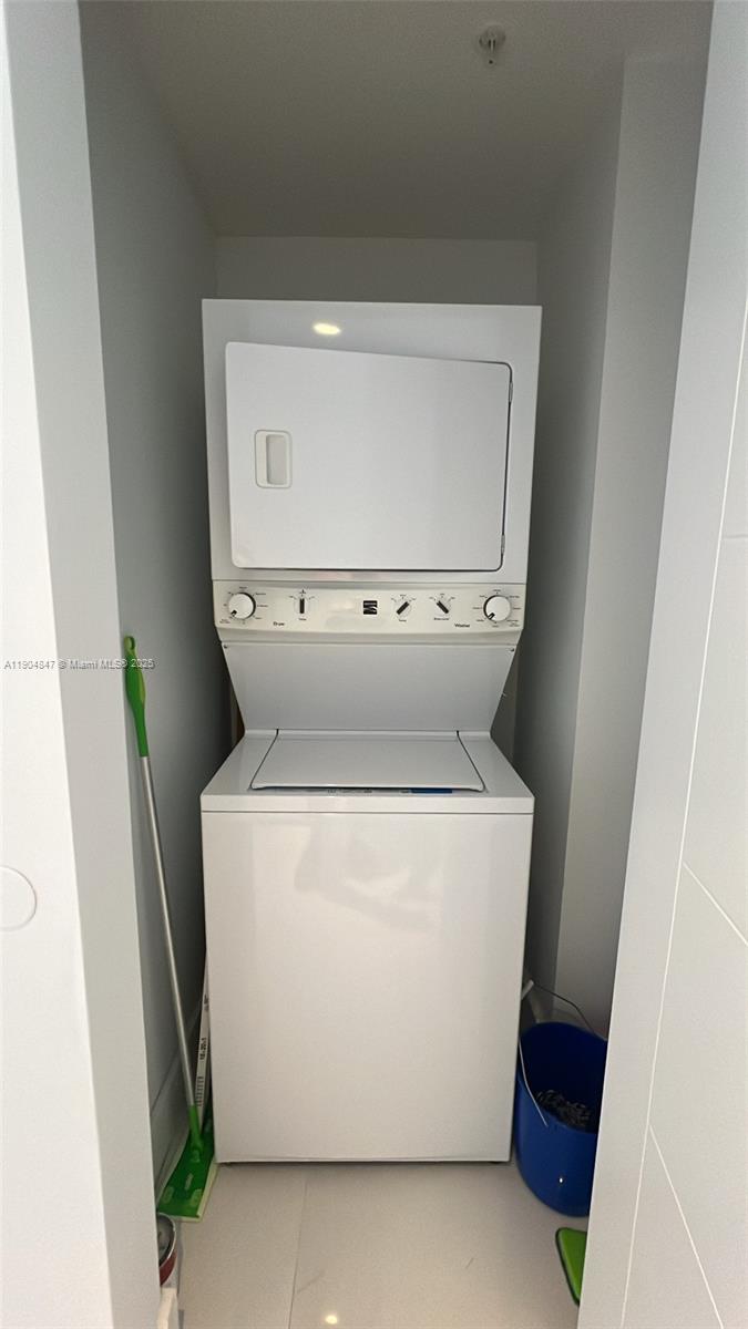 Brickell Miami, FL 33130 - Photo 10 of 12 a utility room with dryer and washer