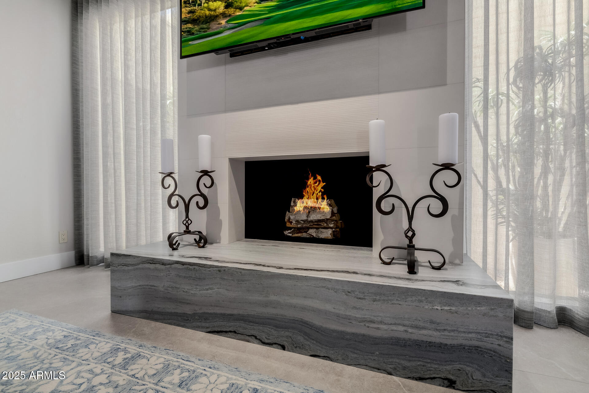 7322 East McLellan Boulevard Scottsdale, AZ 85250 - Photo 15 of 64 a view of fireplace and window in a room