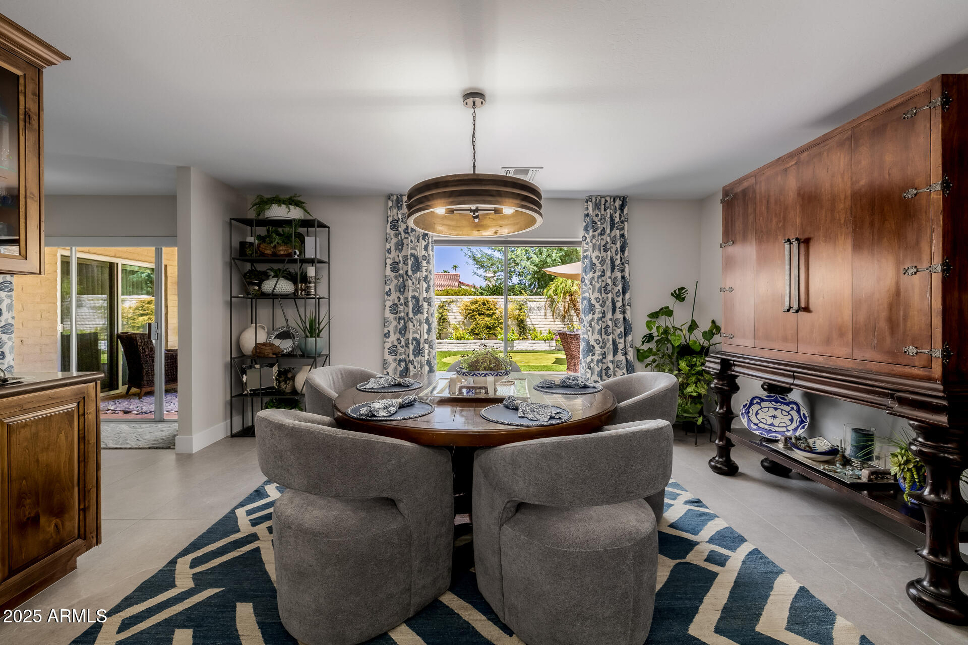 7322 East McLellan Boulevard Scottsdale, AZ 85250 - Photo 18 of 64 a room with furniture and a window