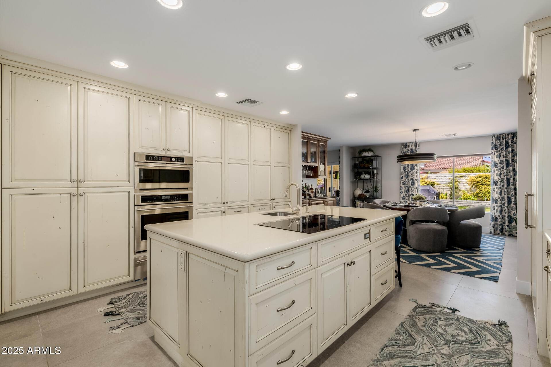 7322 East McLellan Boulevard Scottsdale, AZ 85250 - Photo 20 of 64 a kitchen with a sink stove and refrigerator
