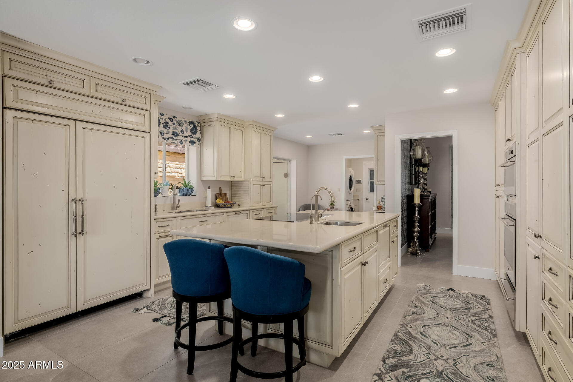 7322 East McLellan Boulevard Scottsdale, AZ 85250 - Photo 23 of 64 a large kitchen with a sink and a refrigerator