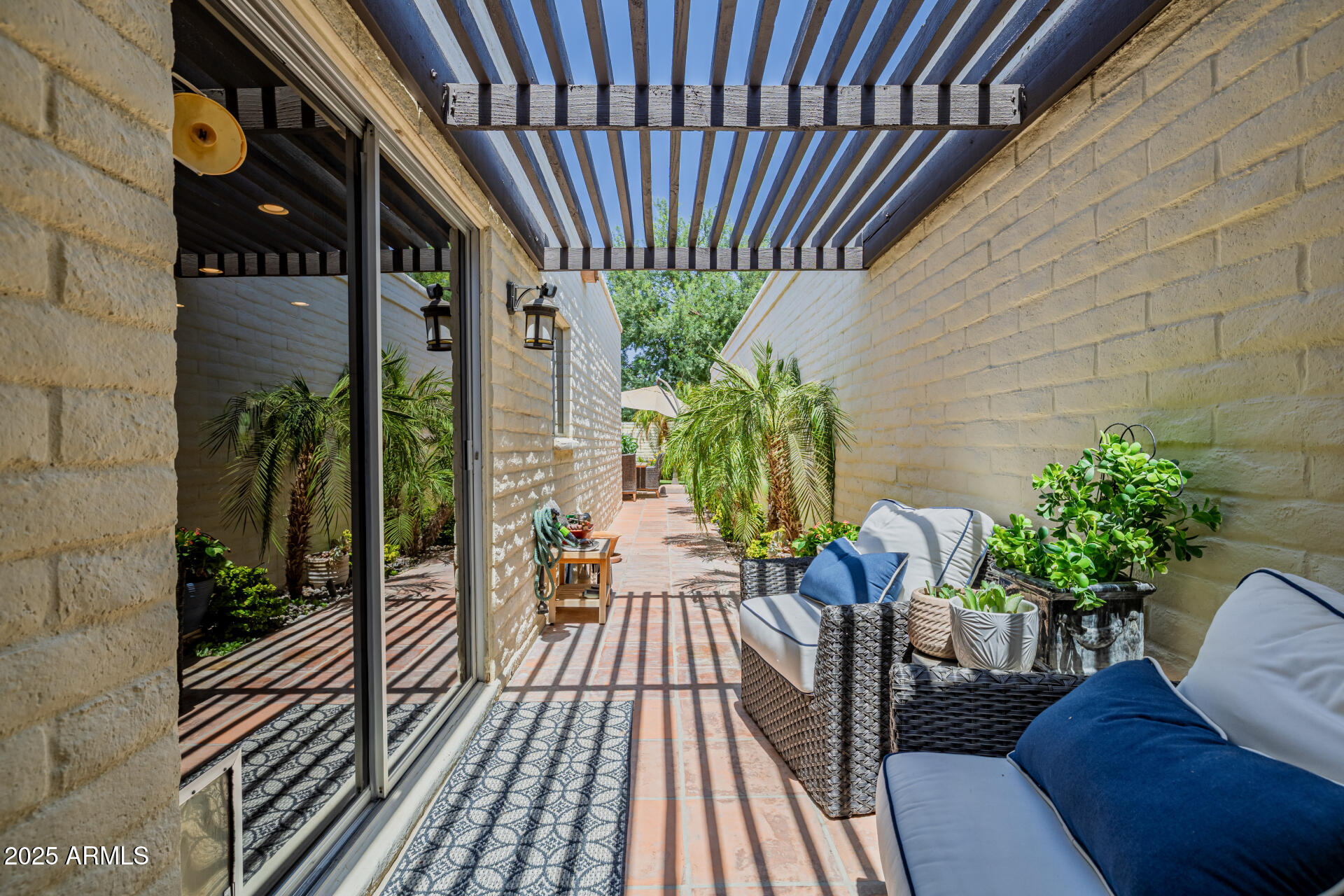 7322 East McLellan Boulevard Scottsdale, AZ 85250 - Photo 35 of 64 a view of a balcony with chairs potted plants