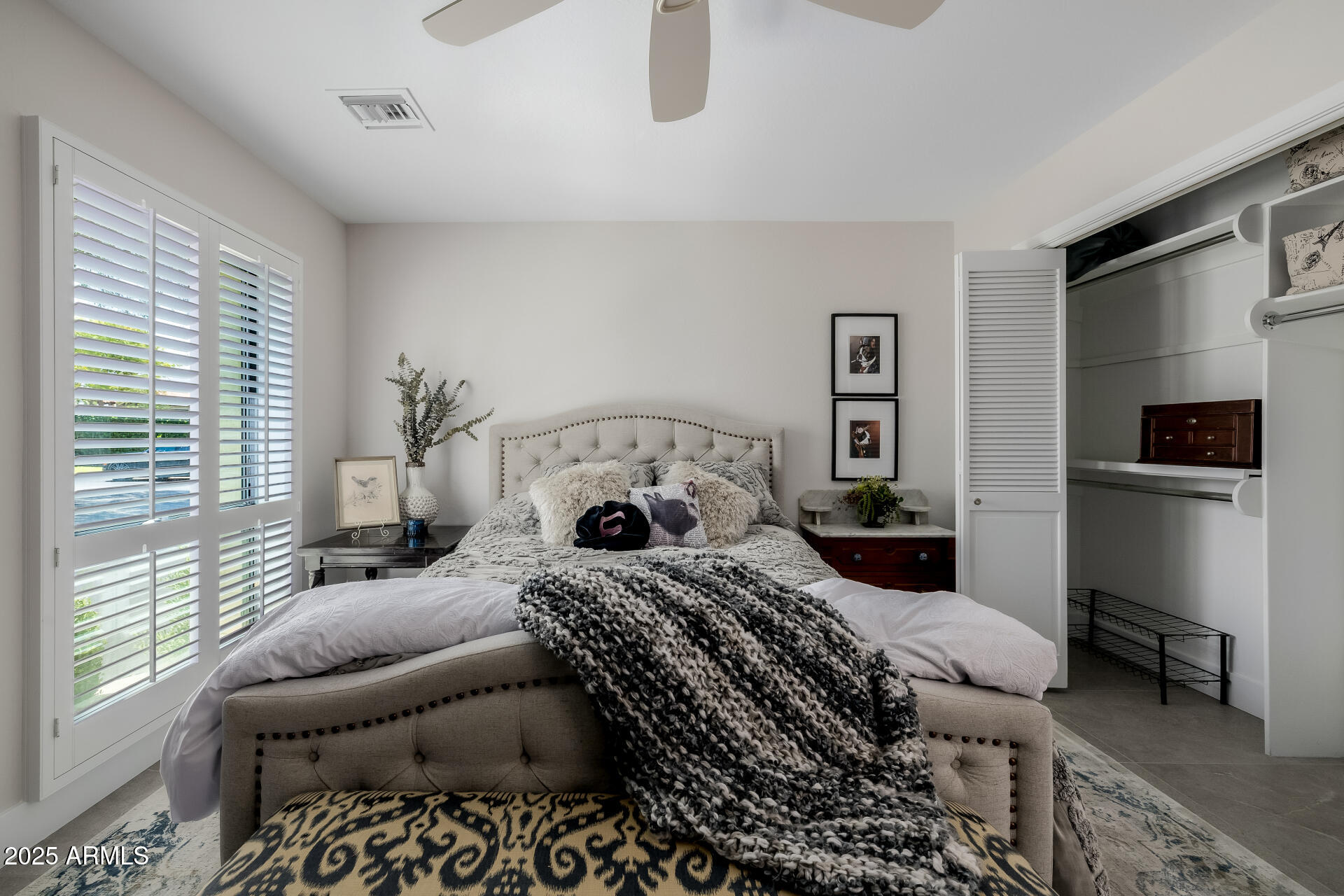 7322 East McLellan Boulevard Scottsdale, AZ 85250 - Photo 38 of 64 a bedroom with a bed and furniture