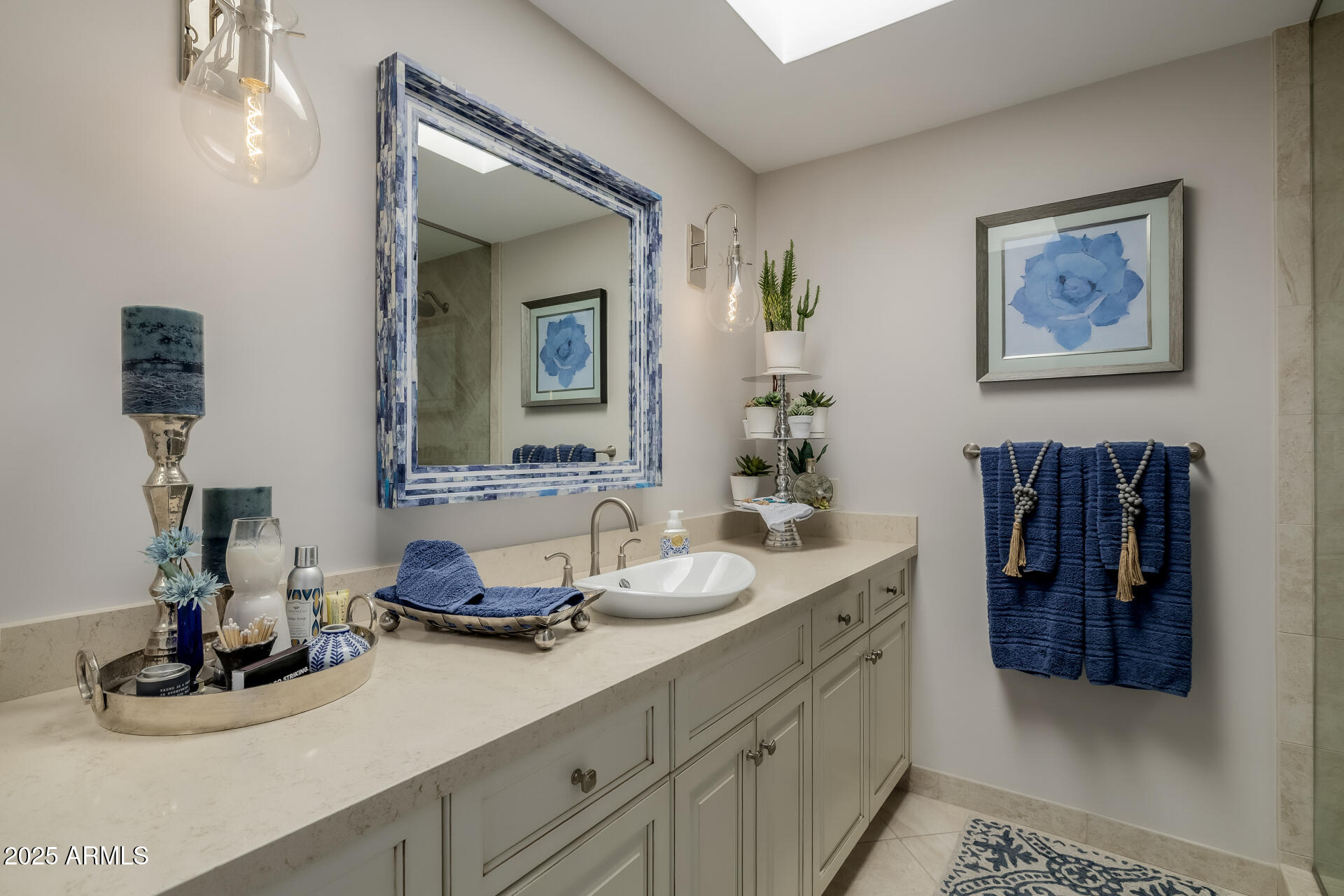 7322 East McLellan Boulevard Scottsdale, AZ 85250 - Photo 39 of 64 a bathroom with a double vanity sink and a mirror