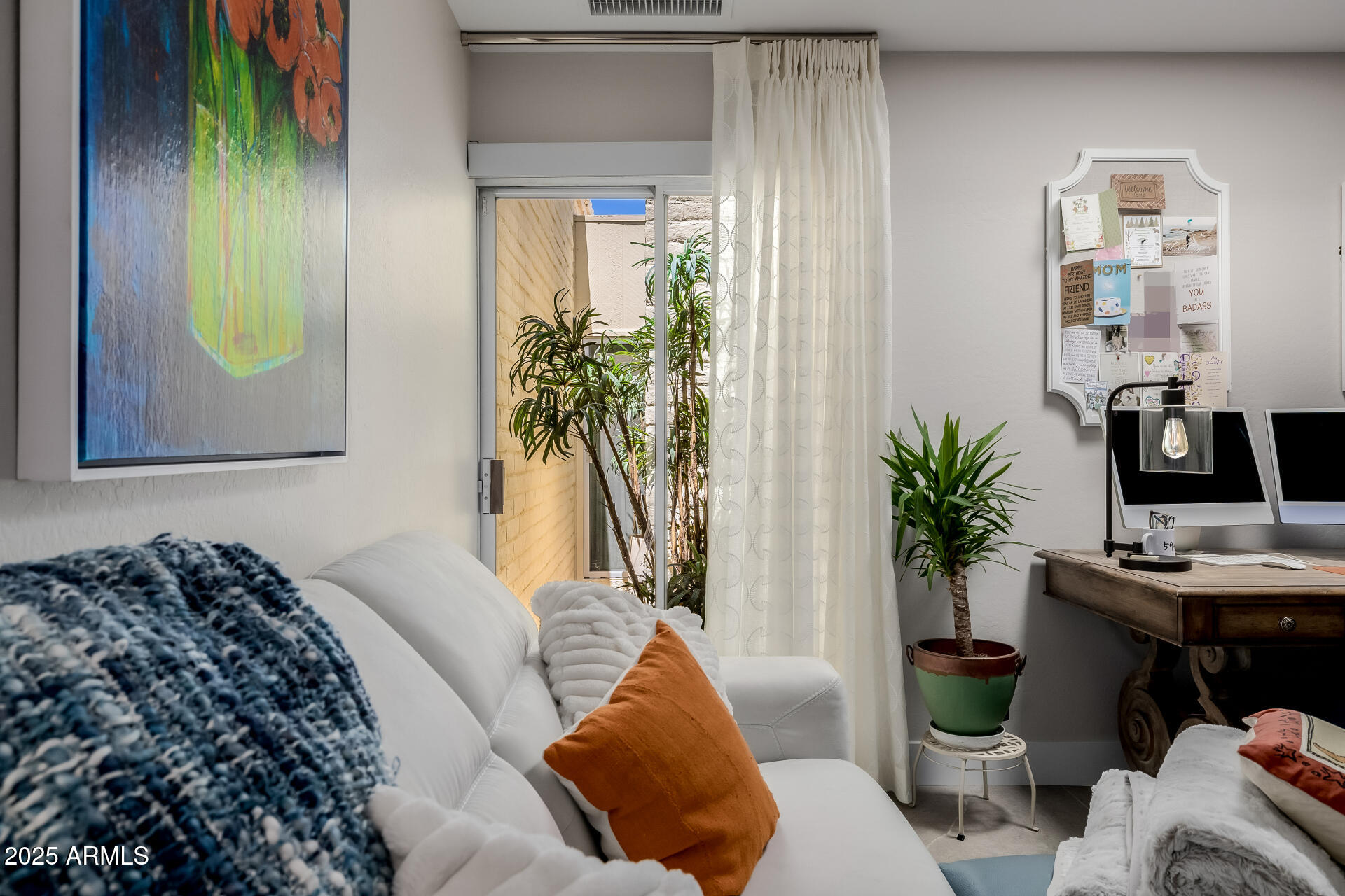 7322 East McLellan Boulevard Scottsdale, AZ 85250 - Photo 44 of 64 a bedroom with a bed and a potted plant