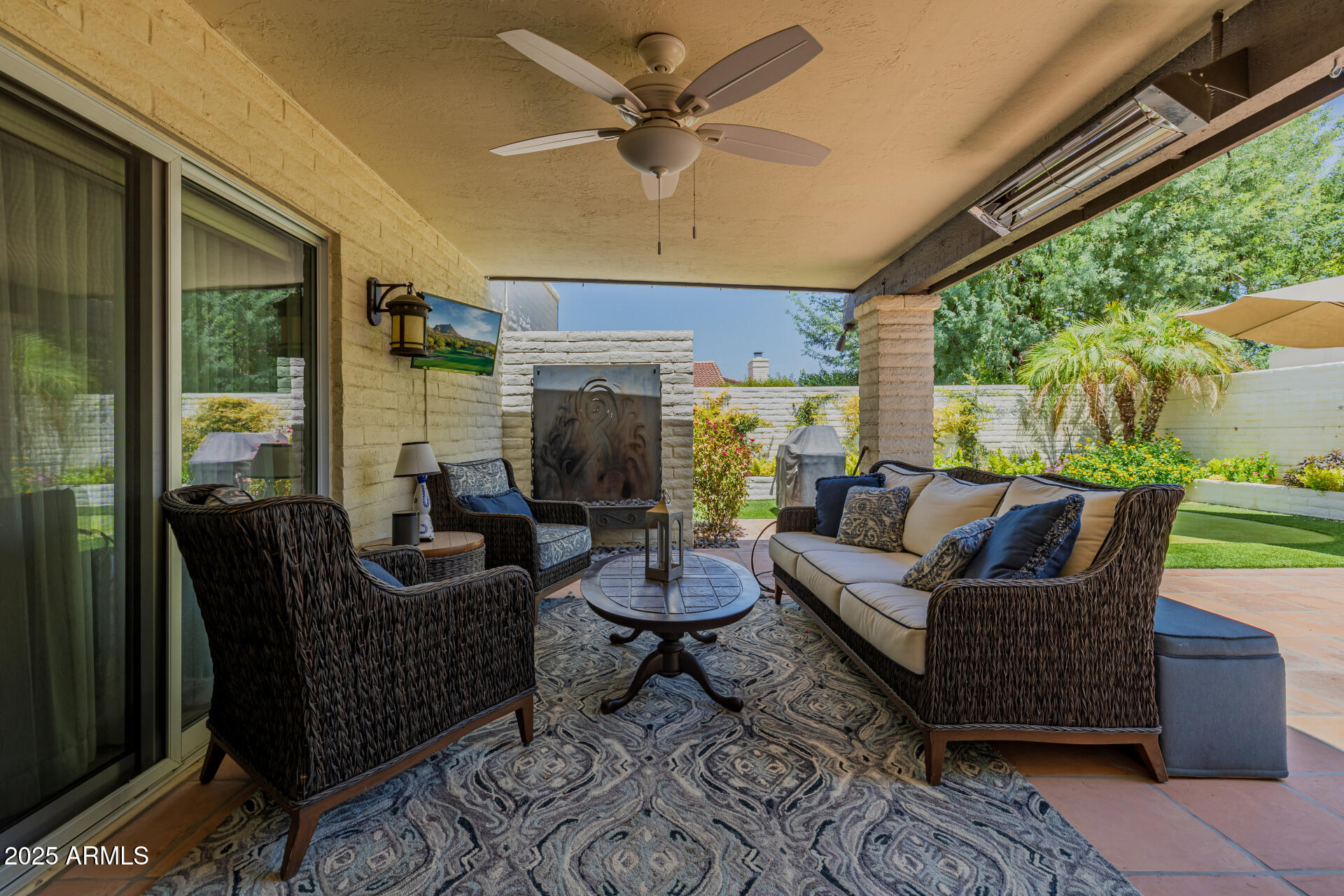 7322 East McLellan Boulevard Scottsdale, AZ 85250 - Photo 46 of 64 a living room with furniture and a large window