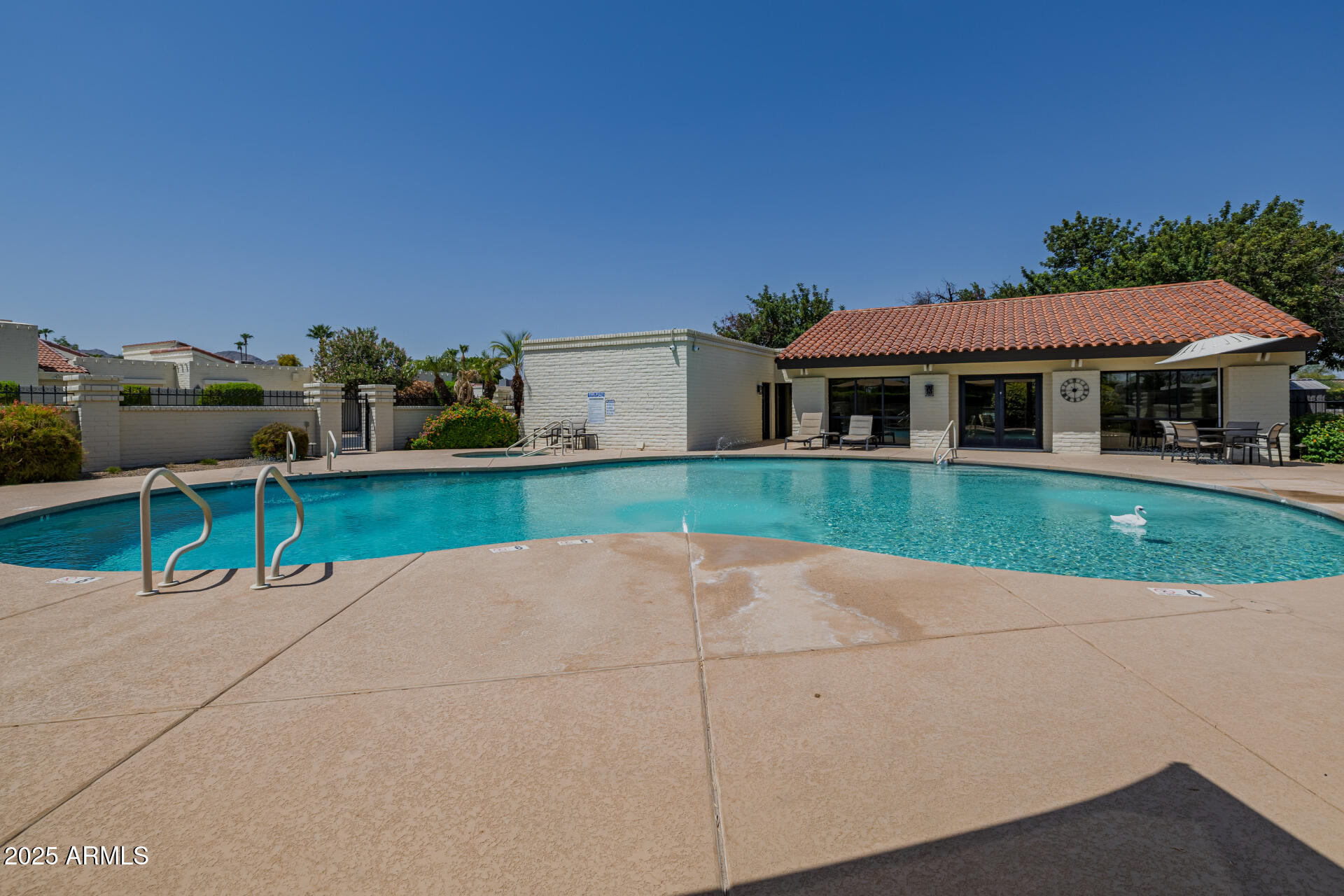7322 East McLellan Boulevard Scottsdale, AZ 85250 - Photo 56 of 64 a view of a house with a yard