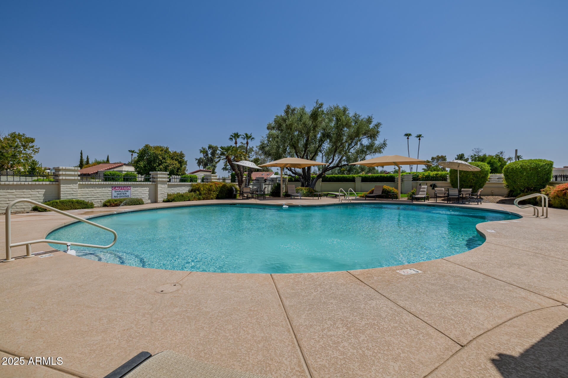 7322 East McLellan Boulevard Scottsdale, AZ 85250 - Photo 58 of 64 a view of a house with a yard and a fountain