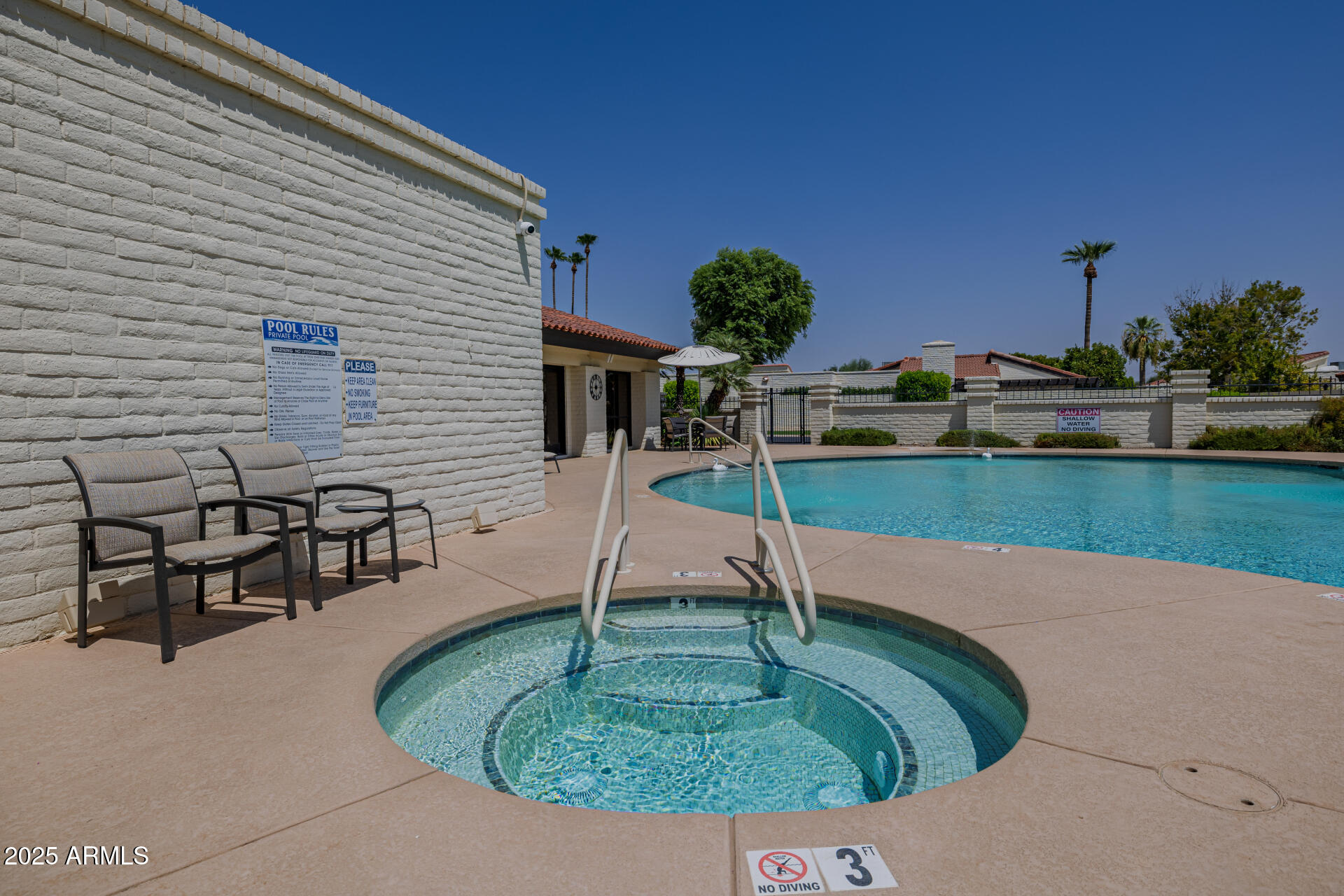 7322 East McLellan Boulevard Scottsdale, AZ 85250 - Photo 59 of 64 a view of a swimming pool with a patio