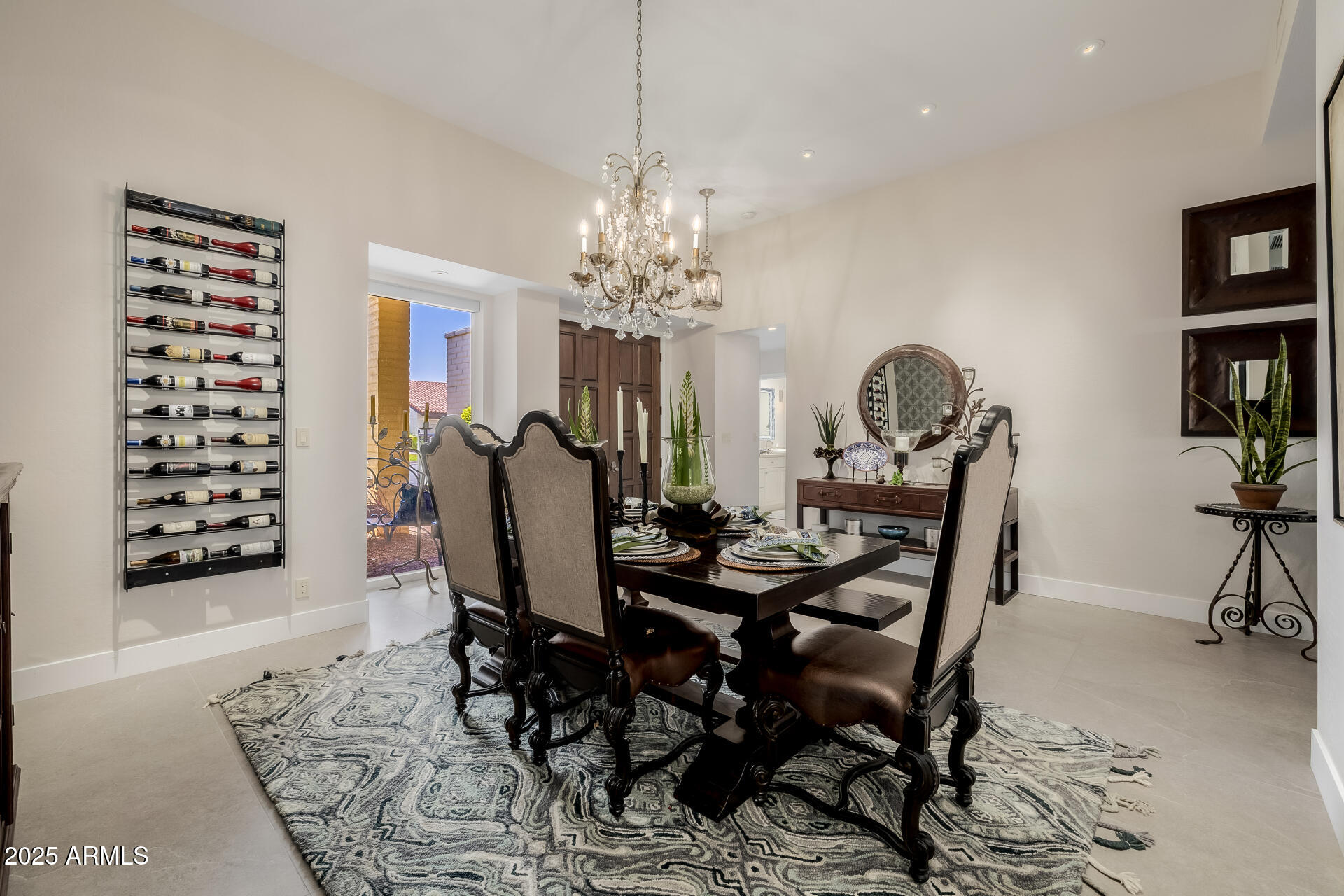 7322 East McLellan Boulevard Scottsdale, AZ 85250 - Photo 7 of 64 a view of a dining room with furniture and chandelier