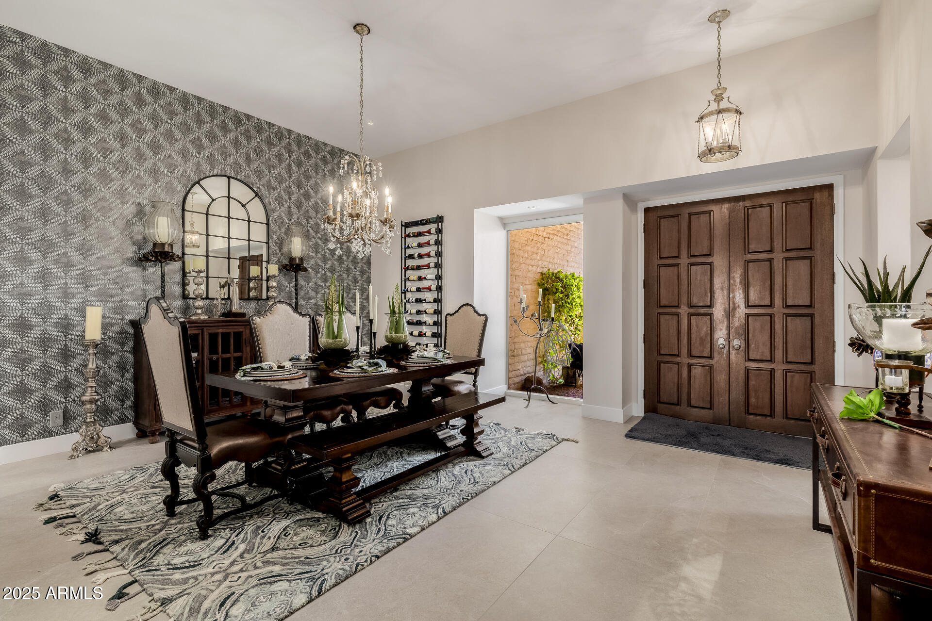 7322 East McLellan Boulevard Scottsdale, AZ 85250 - Photo 9 of 64 a living room with furniture a window and a chandelier