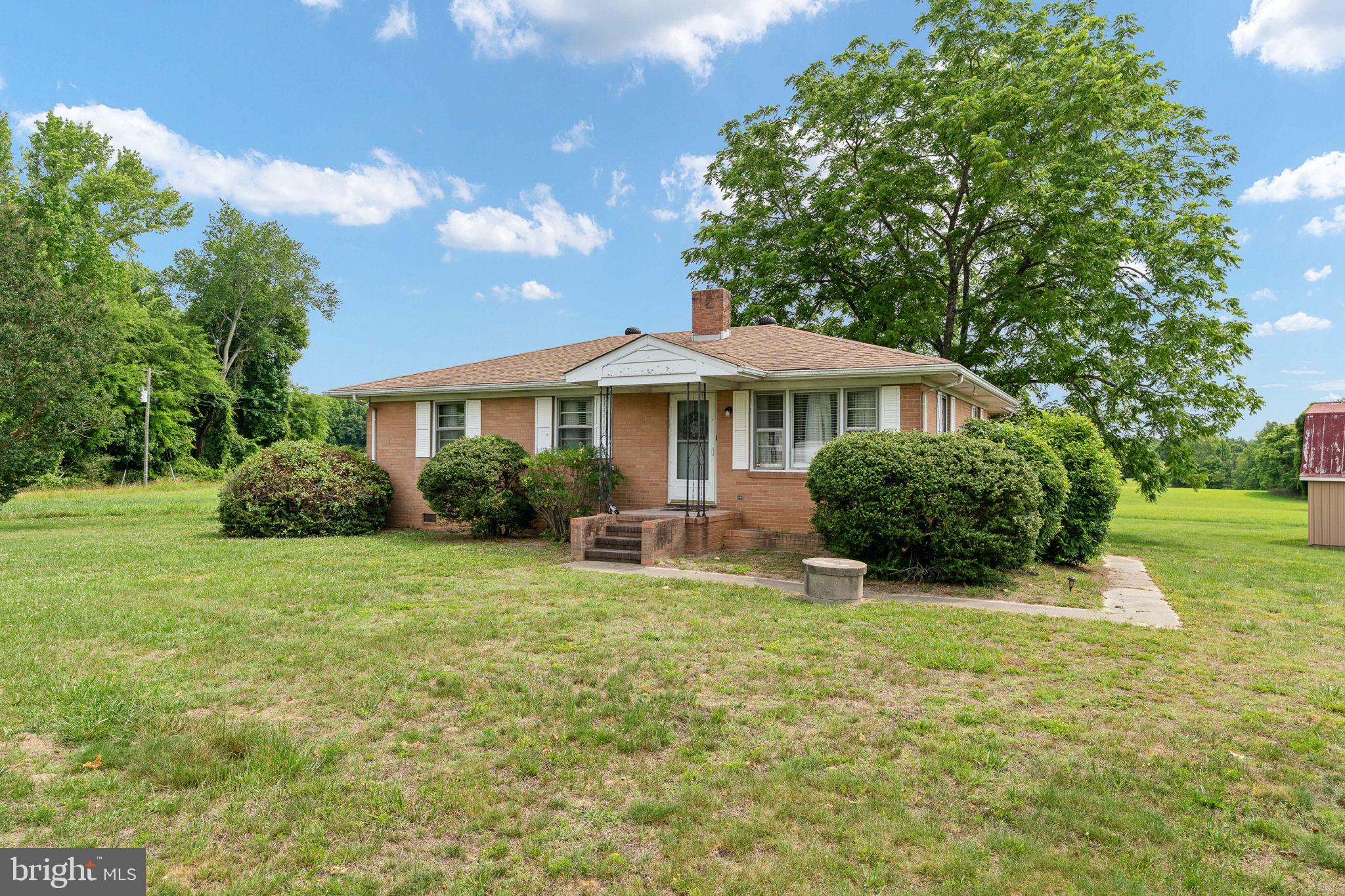 1440 Holly Farm Road Burkeville, VA 23922 - Photo 9 of 52 Charming brick home on spacious grounds.