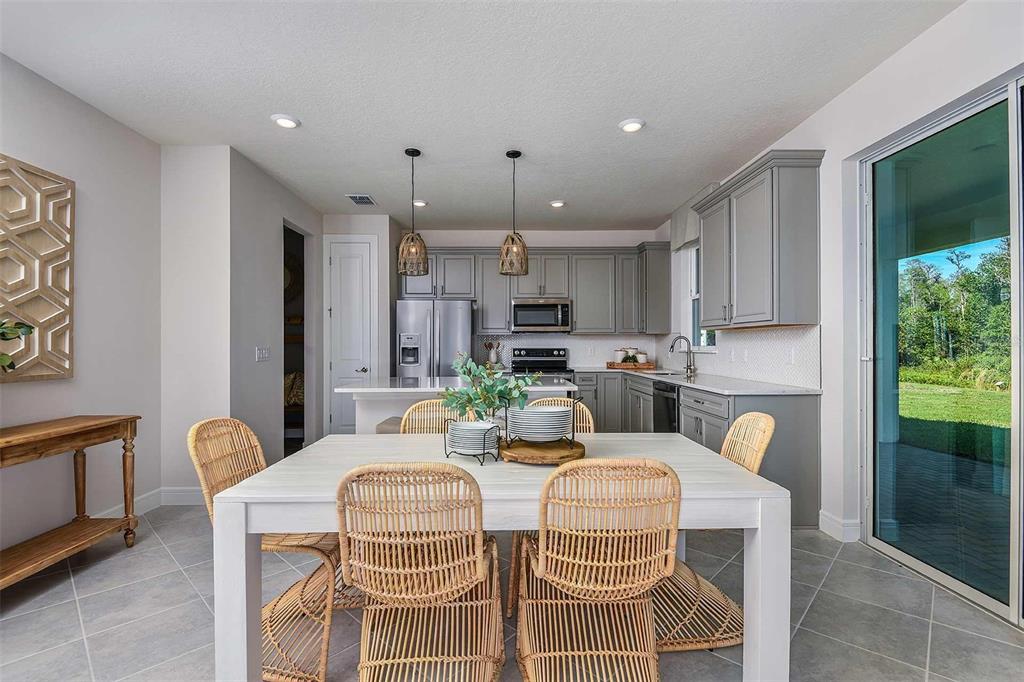 1844 Groveline Road St. Cloud, FL 34771 - Photo 38 of 44 Model Home Design Only. Pictures and furnishings are for illustrative purposes only. Elevations, colors and options may vary. Furniture is for model home staging only.