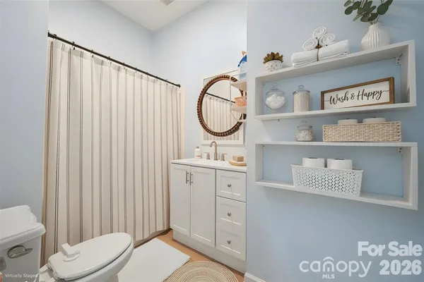 a bathroom with a sink a toilet and a bathtub