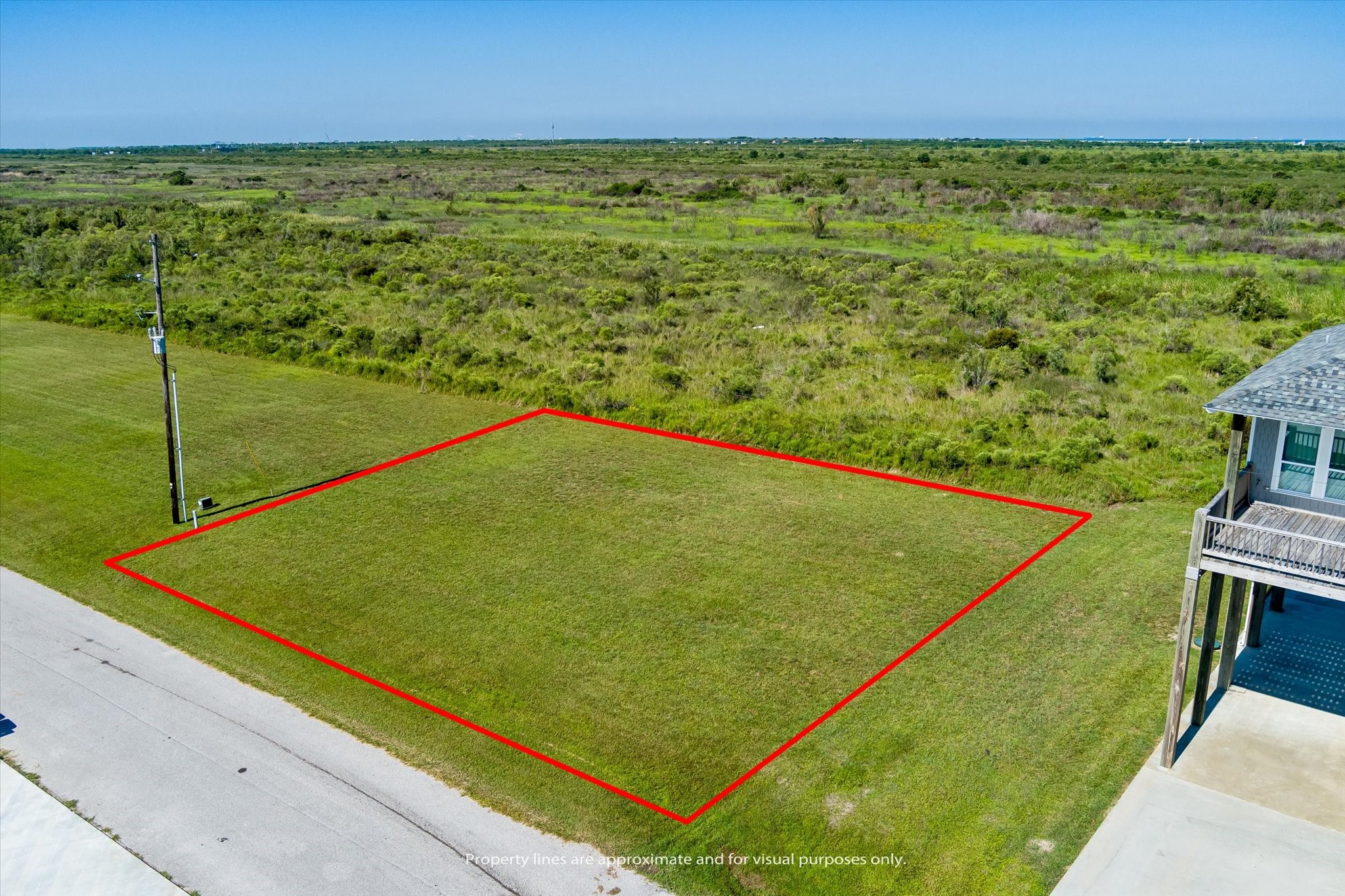 3713 Marble Street Port Bolivar, TX 77650 - Photo 3 of 6 a view of a tennis court