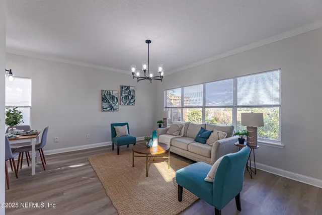 a bathroom with a bathtub a sink and a mirror