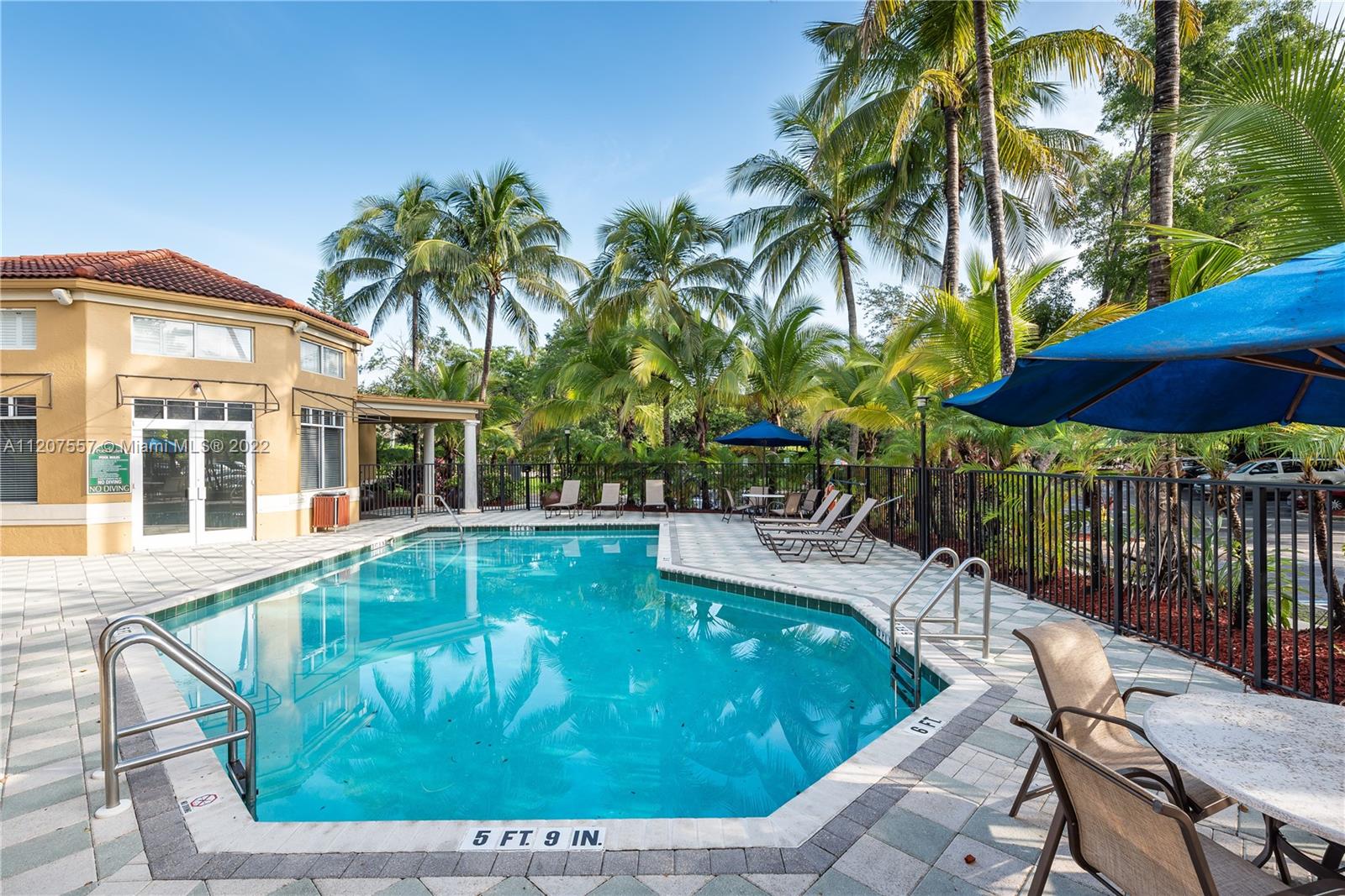 771 North Pine Island Road, Unit 203 Plantation, FL 33324 - Photo 1 of 20 a view of a swimming pool with a patio