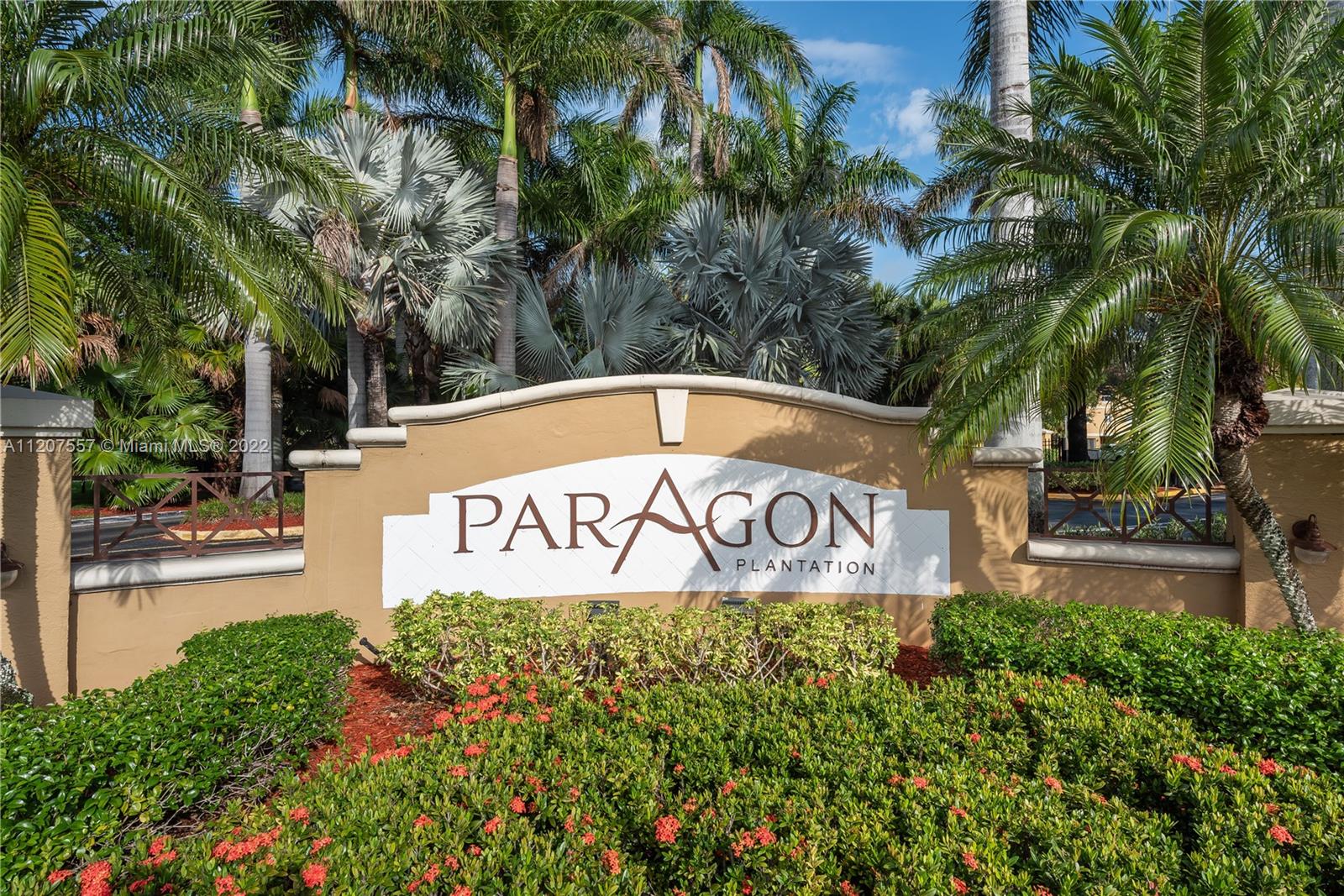 771 North Pine Island Road, Unit 203 Plantation, FL 33324 - Photo 19 of 20 a sign on the side of a building