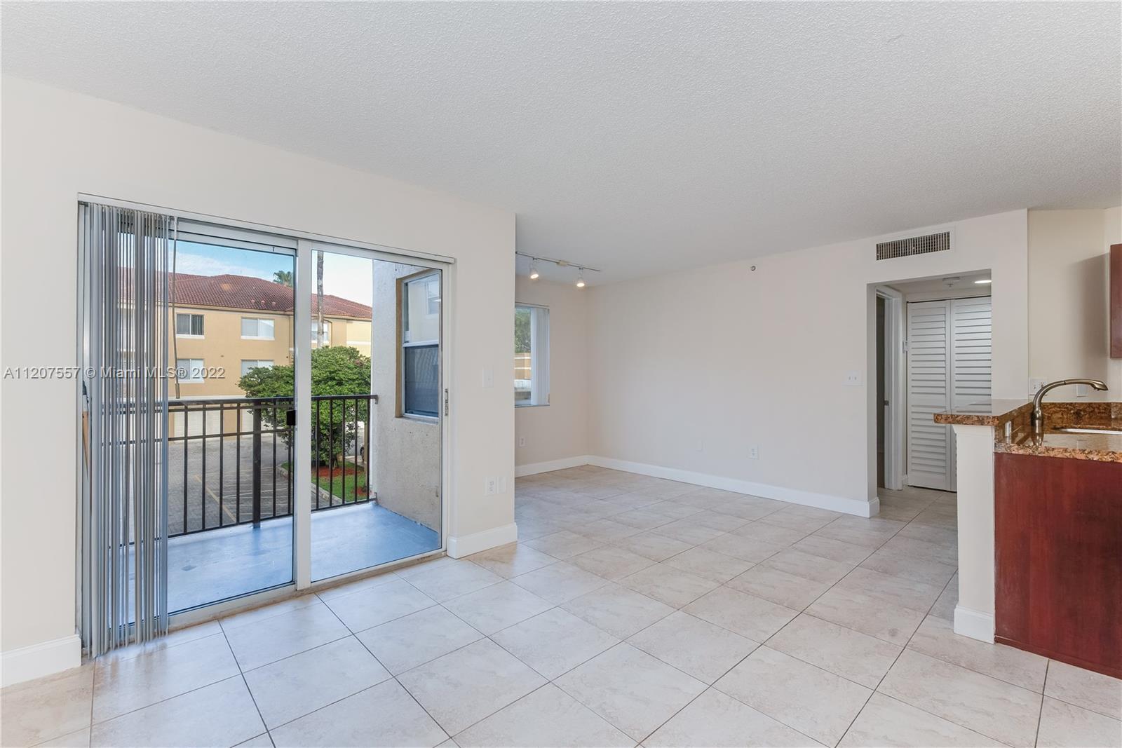 771 North Pine Island Road, Unit 203 Plantation, FL 33324 - Photo 7 of 20 a view of livingroom with furniture