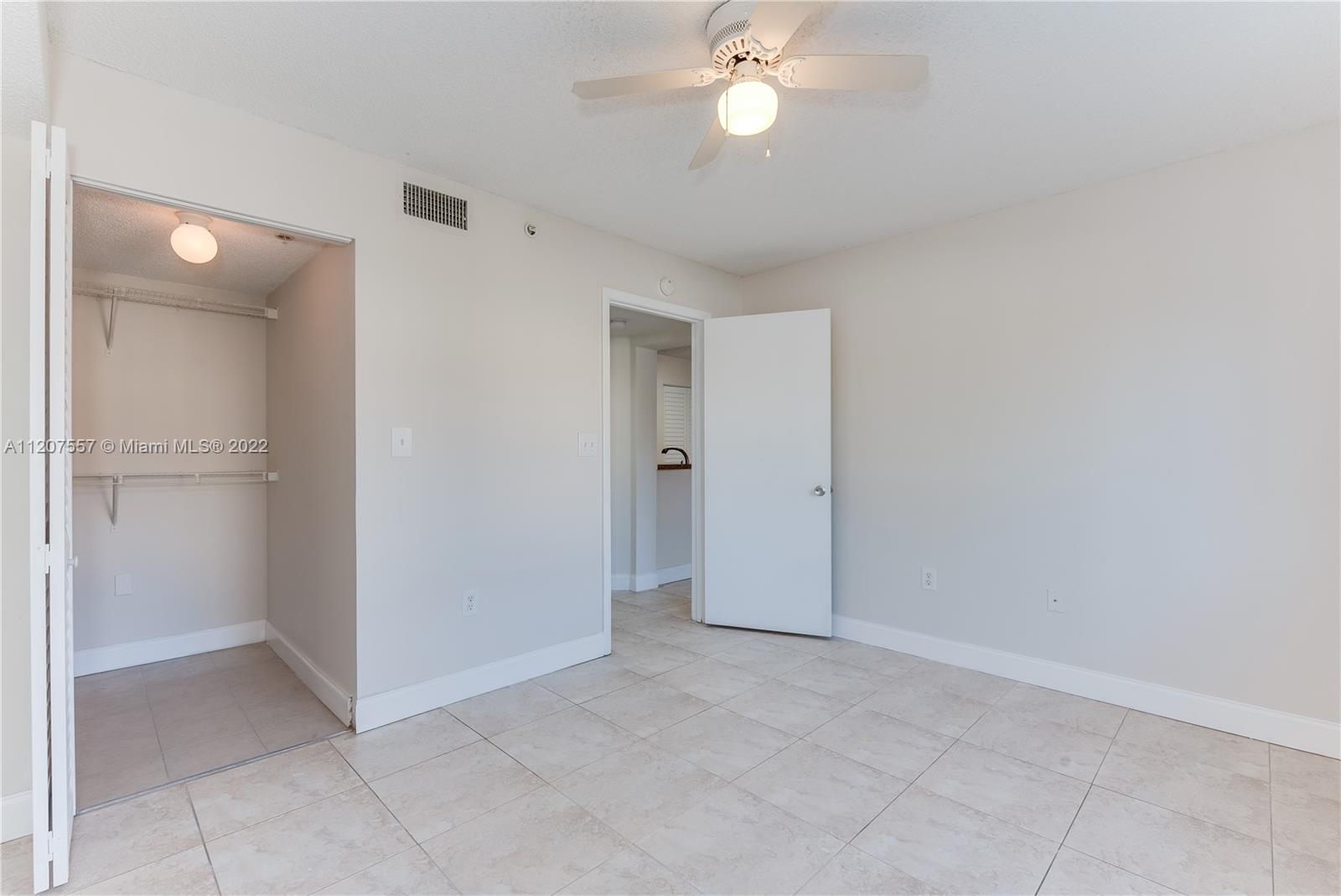 771 North Pine Island Road, Unit 203 Plantation, FL 33324 - Photo 10 of 20 an empty room with a bathroom
