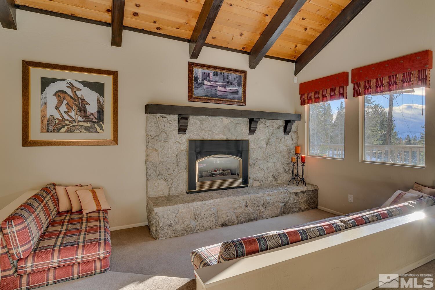 308 Elks Point Road Zephyr Cove, NV 89448 - Photo 11 of 29 a living room with furniture and a floor