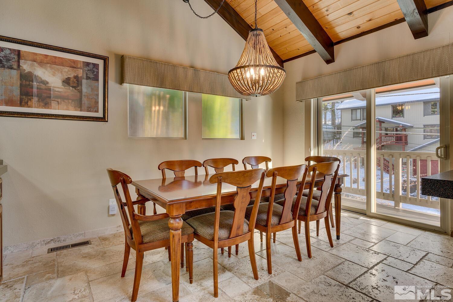 308 Elks Point Road Zephyr Cove, NV 89448 - Photo 16 of 29 a view of a dining room with furniture and chandelier