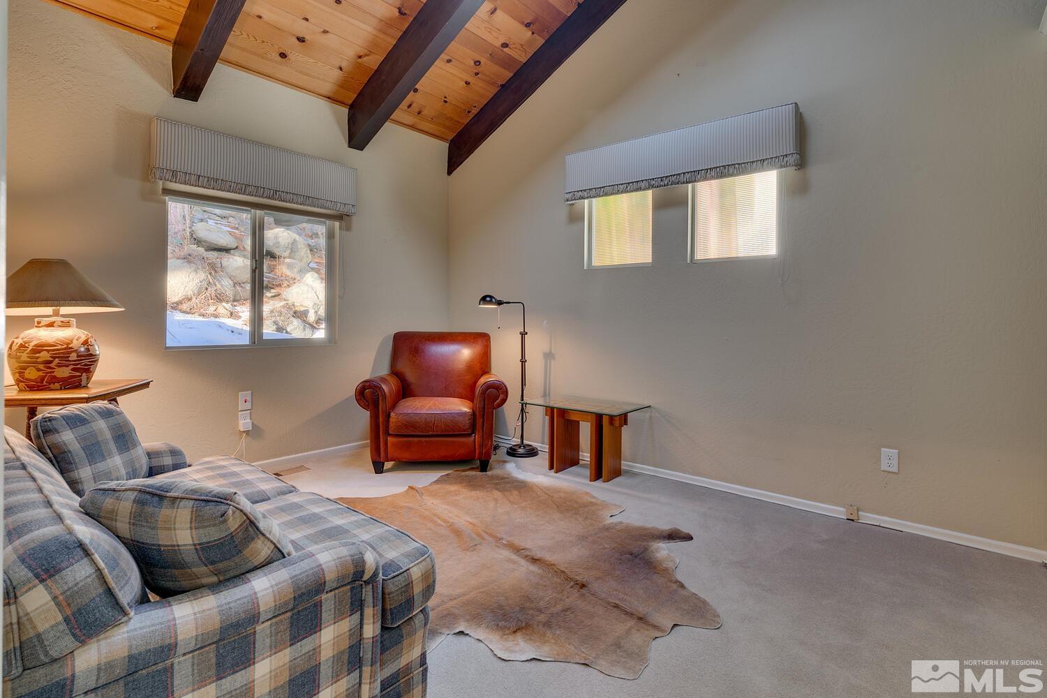 308 Elks Point Road Zephyr Cove, NV 89448 - Photo 26 of 29 a bedroom with furniture and a window