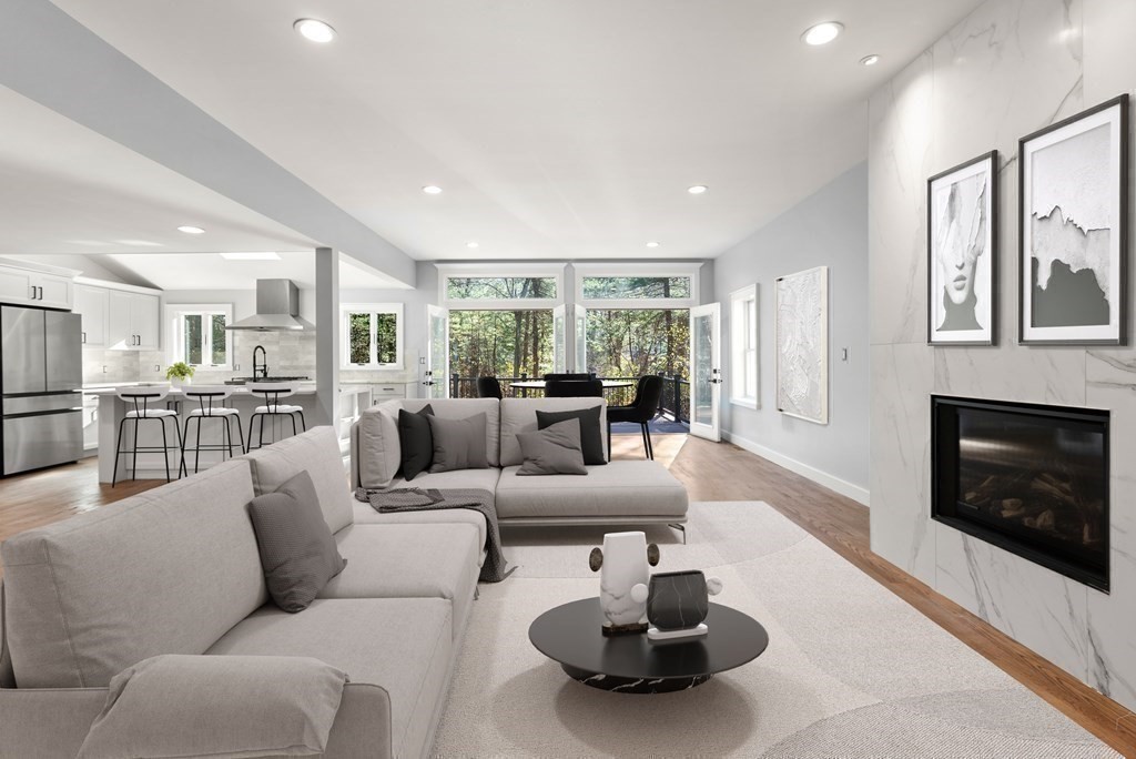 162 Winter Street Weston, MA 02493 - Photo 12 of 36 a living room with furniture and a fireplace