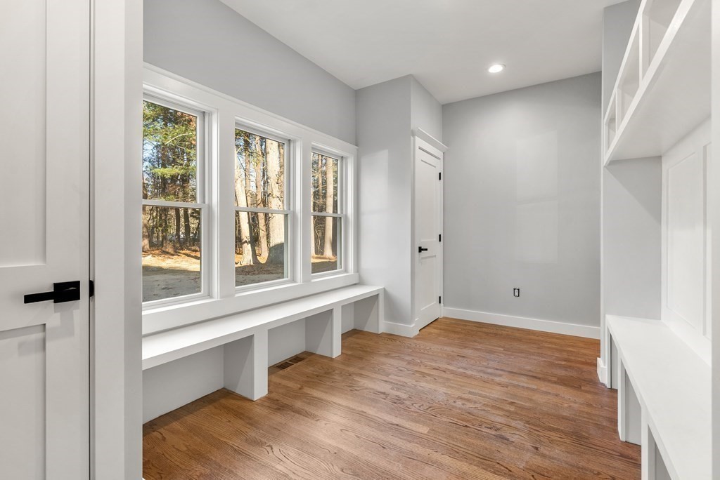 162 Winter Street Weston, MA 02493 - Photo 14 of 36 a view of an empty room with a window