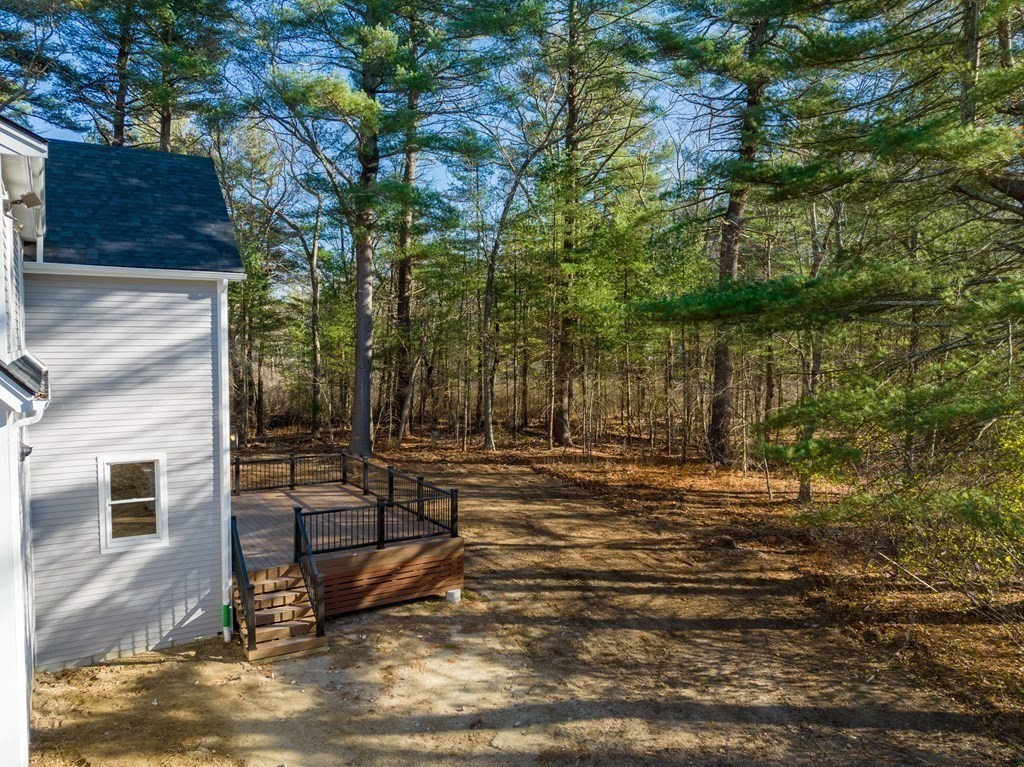 162 Winter Street Weston, MA 02493 - Photo 33 of 36 a view of a backyard of the house