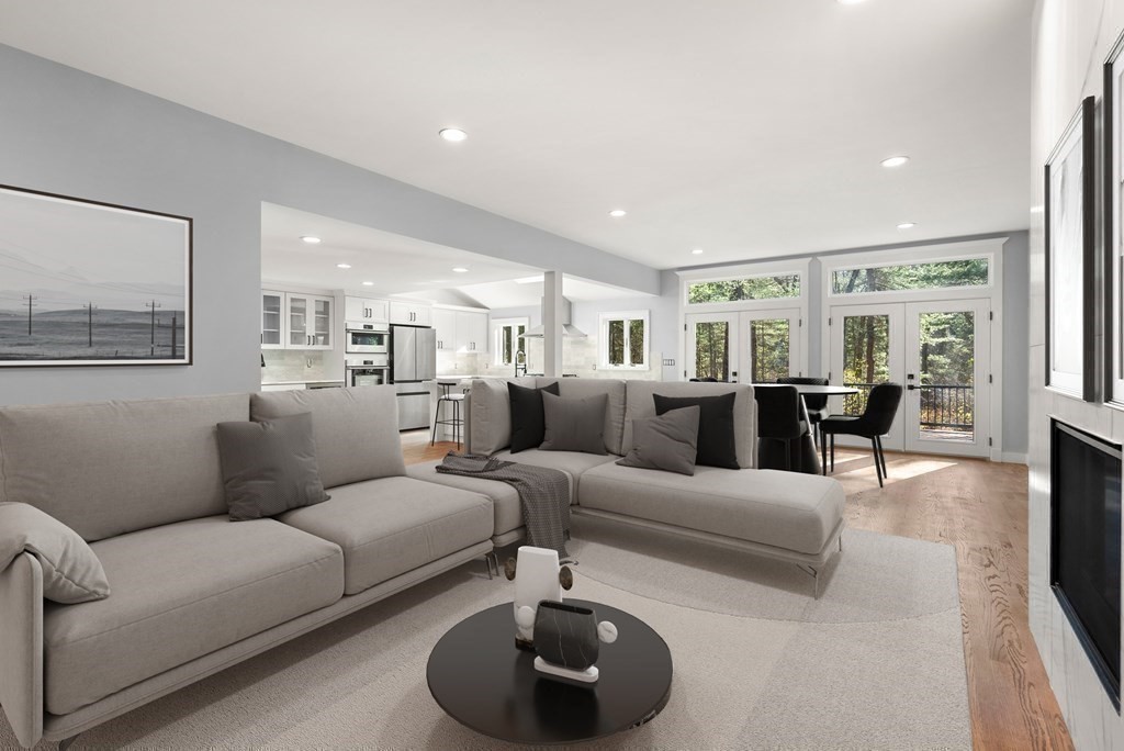 162 Winter Street Weston, MA 02493 - Photo 10 of 36 a living room with furniture and a large window