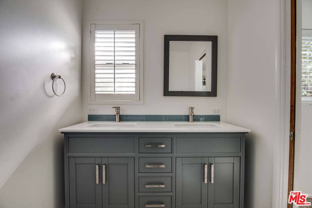 8204 Pershing Drive Playa del Rey, CA 90293 - Photo 18 of 27 a bathroom with a sink and a window