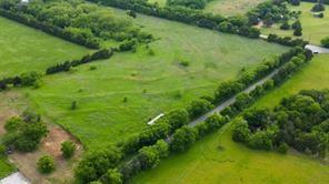Tbd1 Flowing Wells Road Pottsboro, TX 75076 - Photo 11 of 19 a view of a lush green space