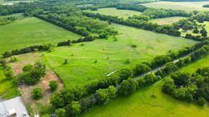 Tbd1 Flowing Wells Road Pottsboro, TX 75076 - Photo 14 of 19 a view of a lush green space
