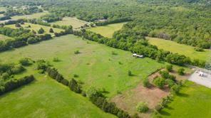 Tbd1 Flowing Wells Road Pottsboro, TX 75076 - Photo 16 of 19 a view of a lake with a yard