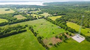 Tbd1 Flowing Wells Road Pottsboro, TX 75076 - Photo 2 of 19 a view of a lush green forest with lots of trees