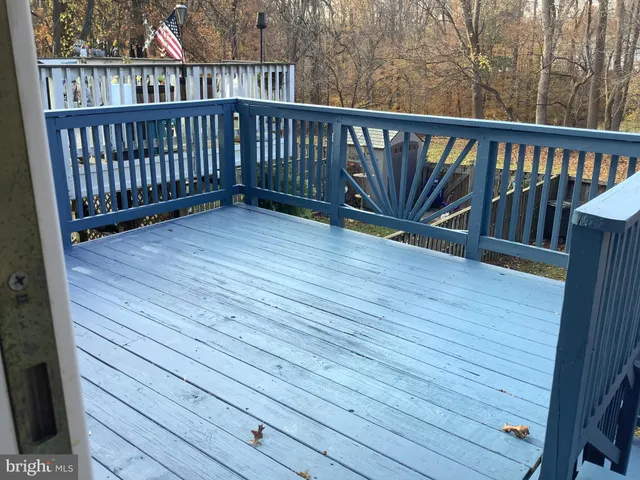 a view of staircase with white walls