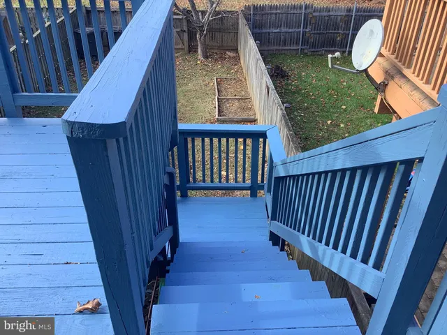 a view of staircase with white walls