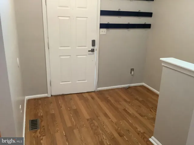 a view of hallway with shower