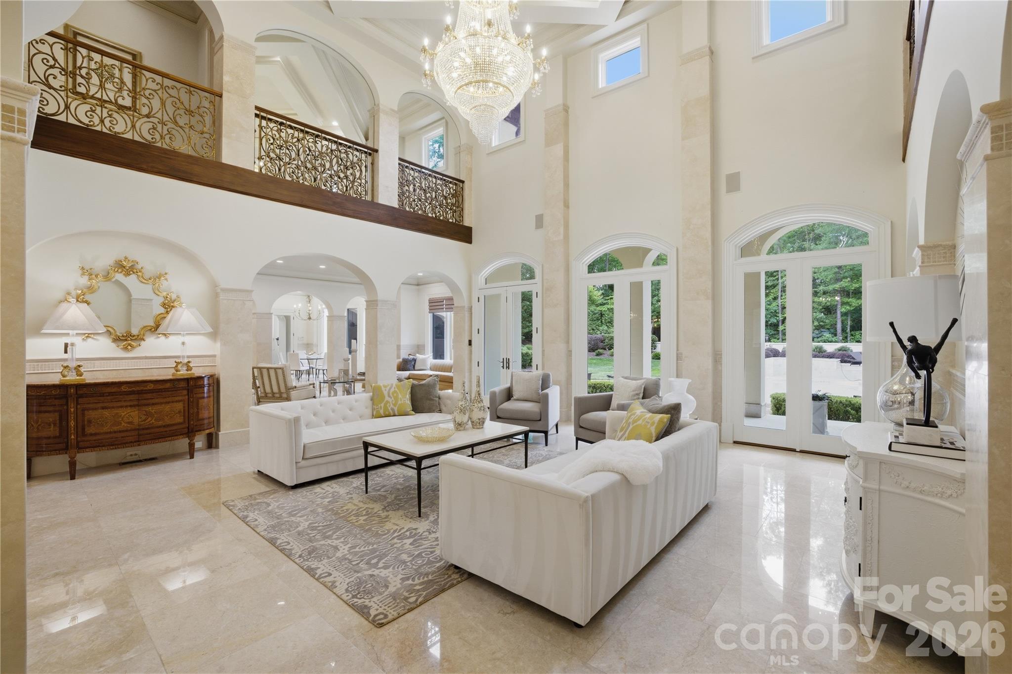 16460 Marvin Road Charlotte, NC 28277 - Photo 11 of 47 a living room with furniture and a chandelier