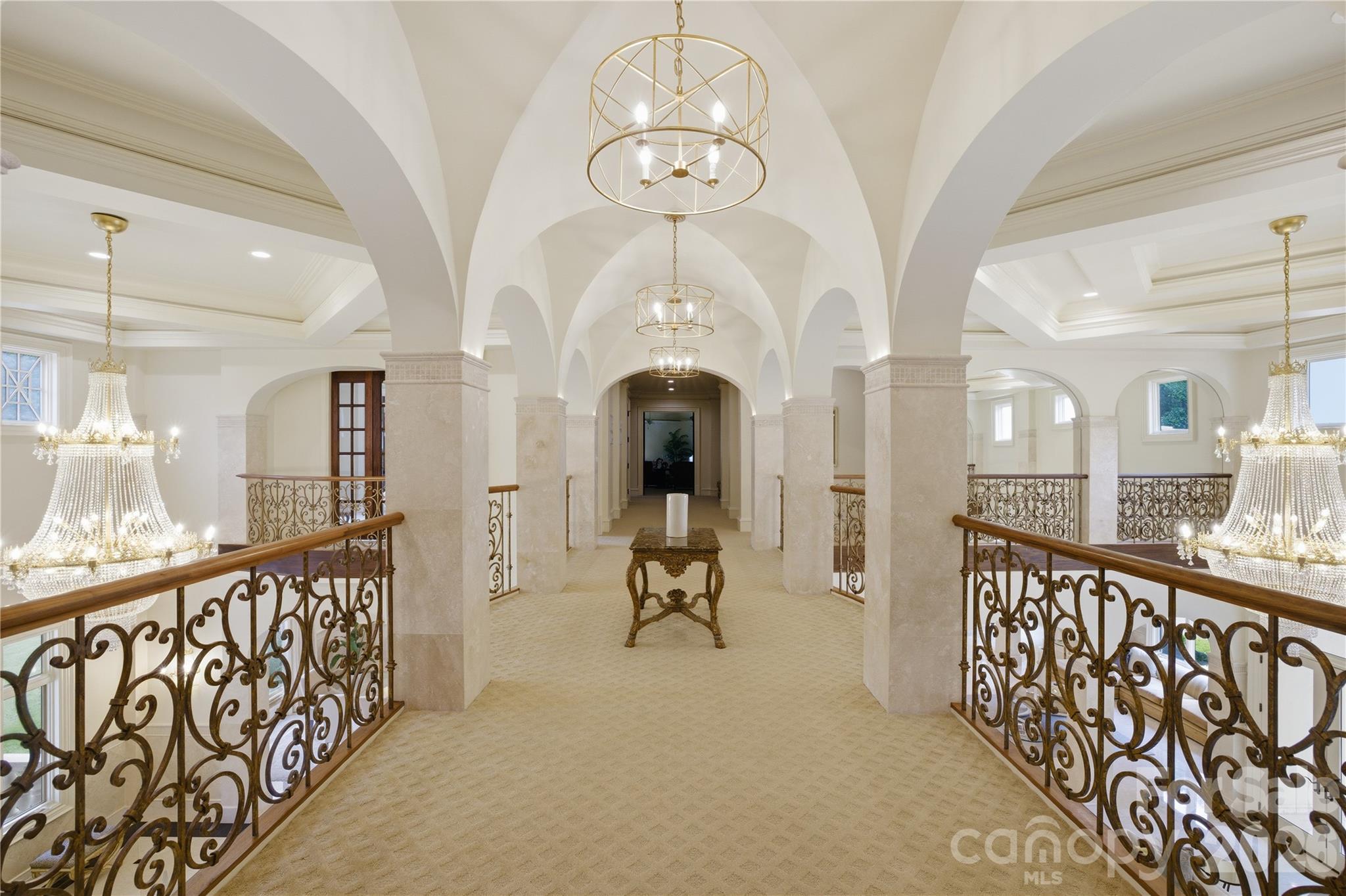16460 Marvin Road Charlotte, NC 28277 - Photo 31 of 47 a view of a hallway with chandelier
