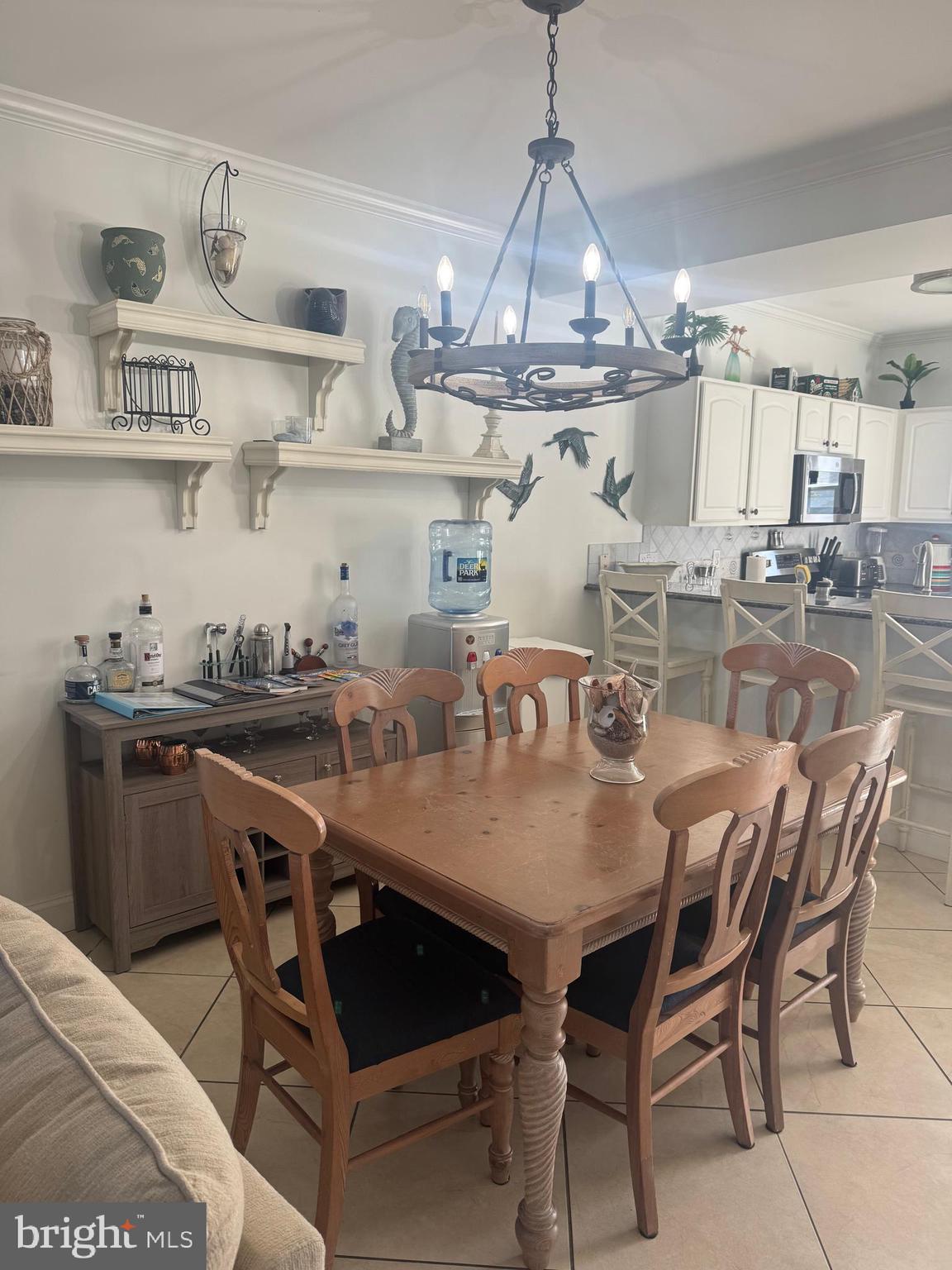 608 B Salt Spray Road, Unit B Ocean City, MD 21842 - Photo 7 of 50 a view of a dining room with furniture